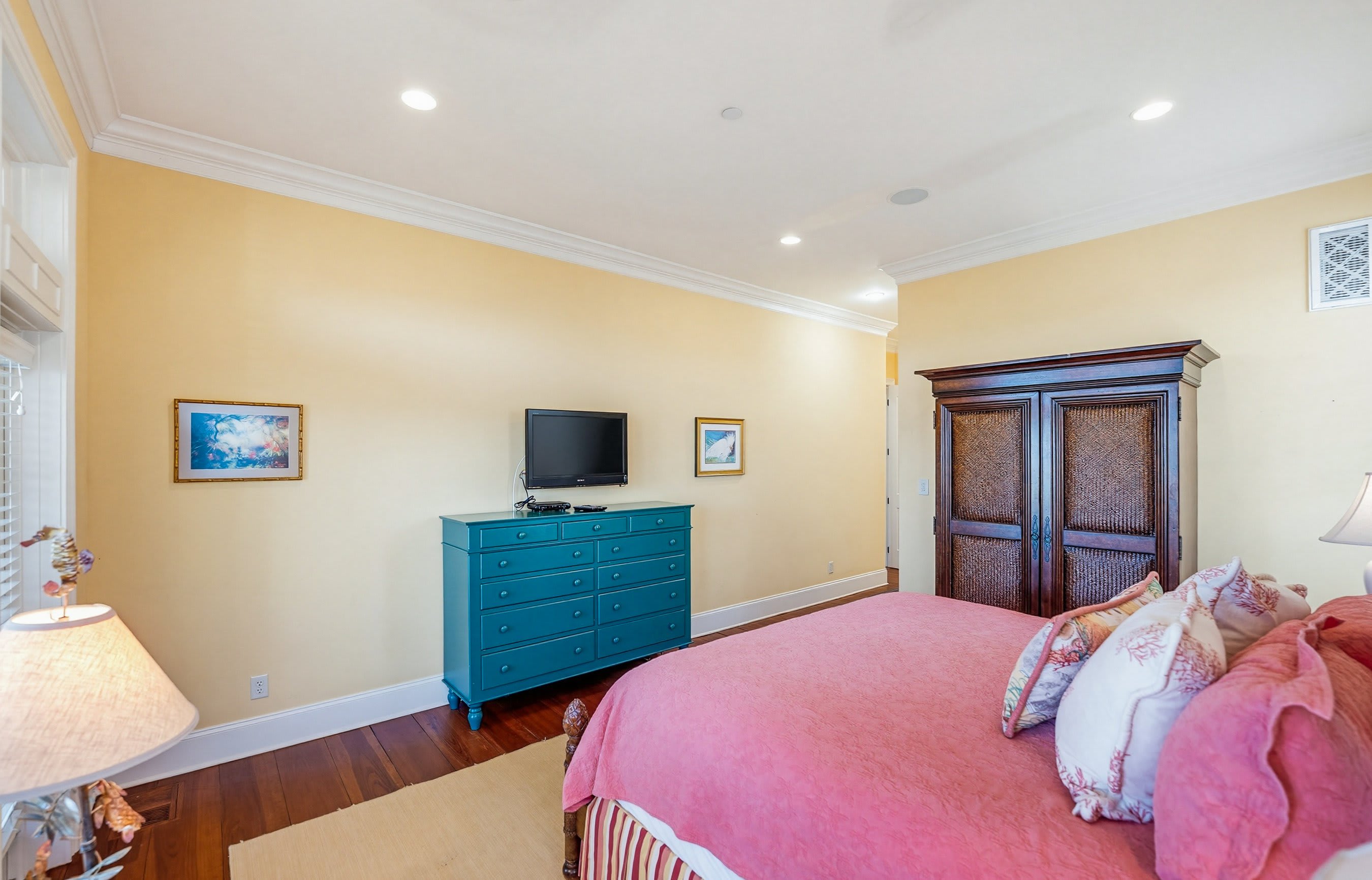 1st Level Primary with King Bed , Full En Suite Bathroom and Access to Screened Porch with Marsh Views