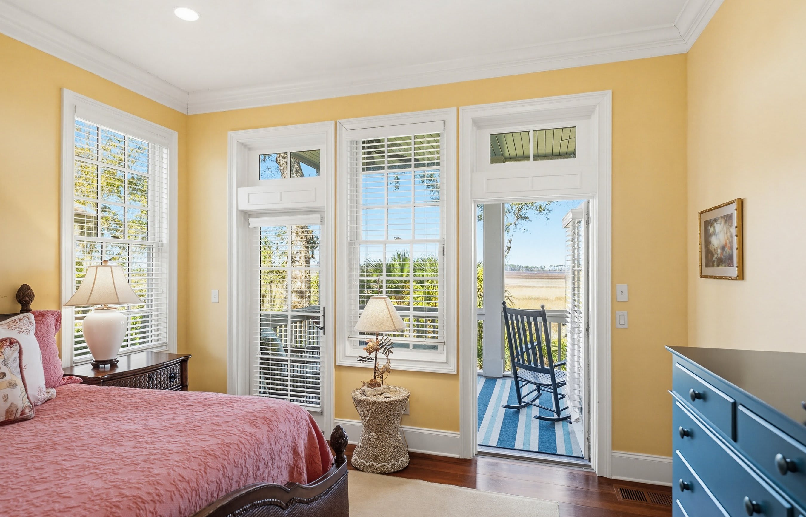 1st Level Primary with King Bed , Full En Suite Bathroom and Access to Screened Porch with Marsh Views