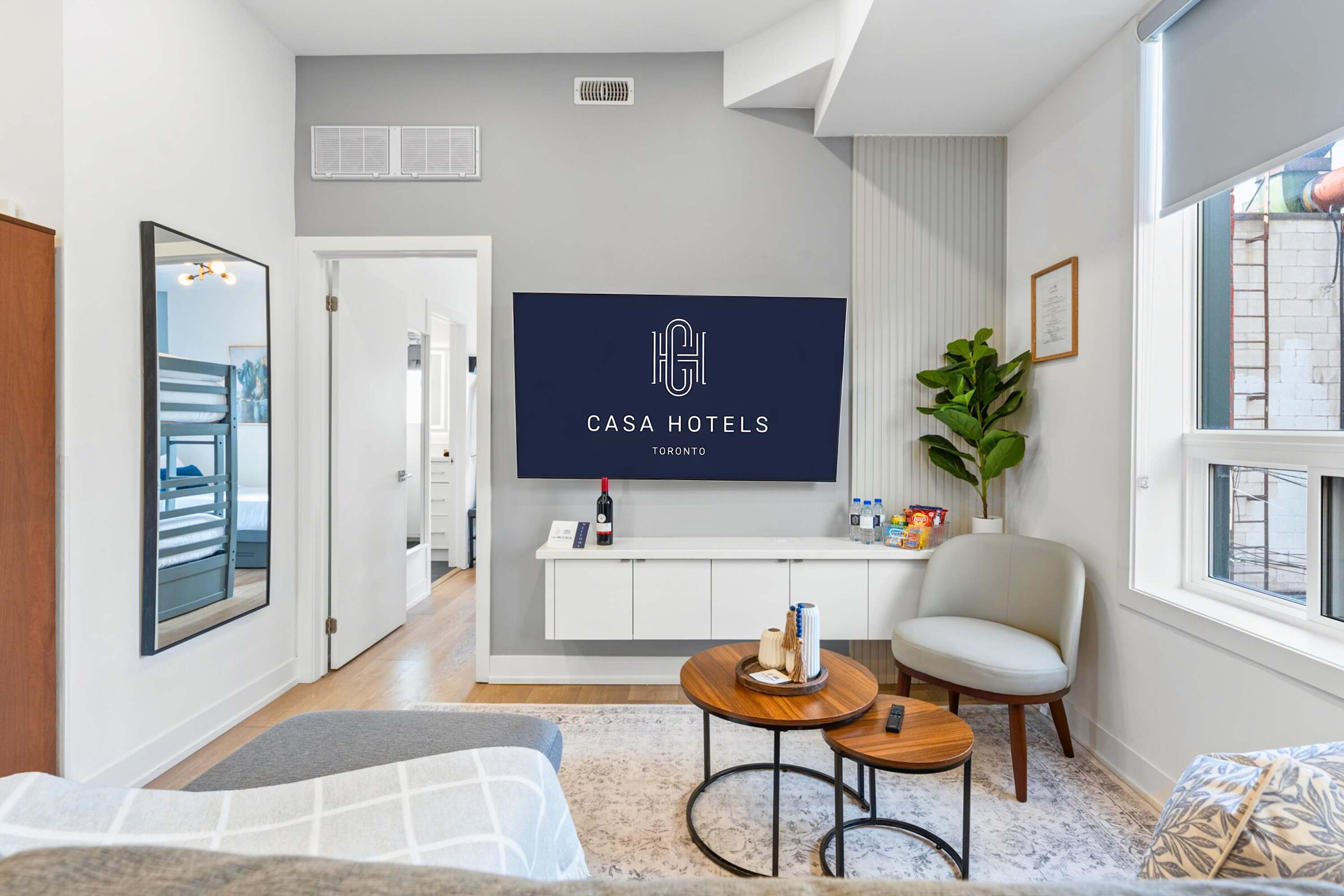 Inviting living room featuring a Smart TV and dedicated work nook.