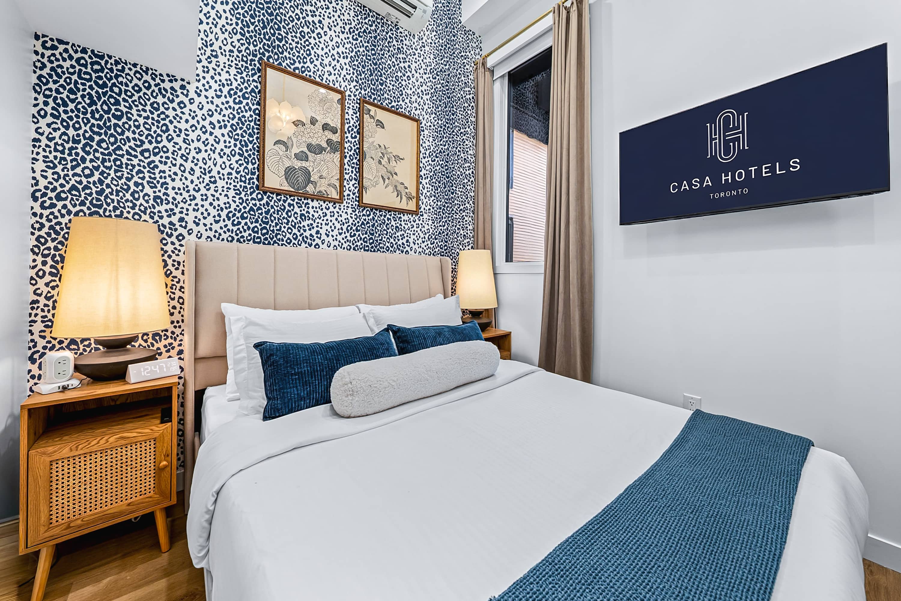 Wake up refreshed in this serene, beautifully finished bedroom with a queen bed and smart TV.