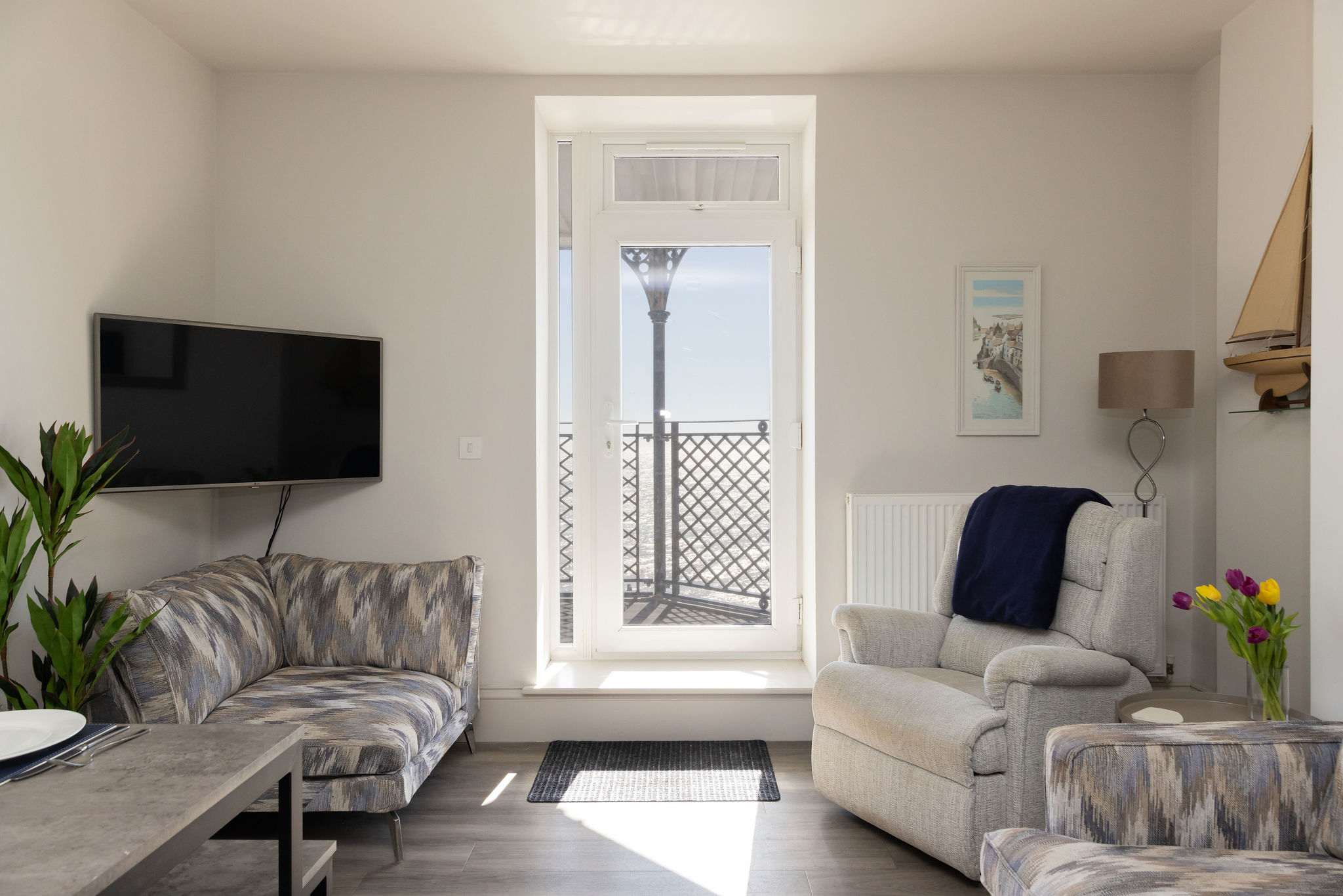 Bright, comfortable interiors create a welcoming space to unwind beside the sea.