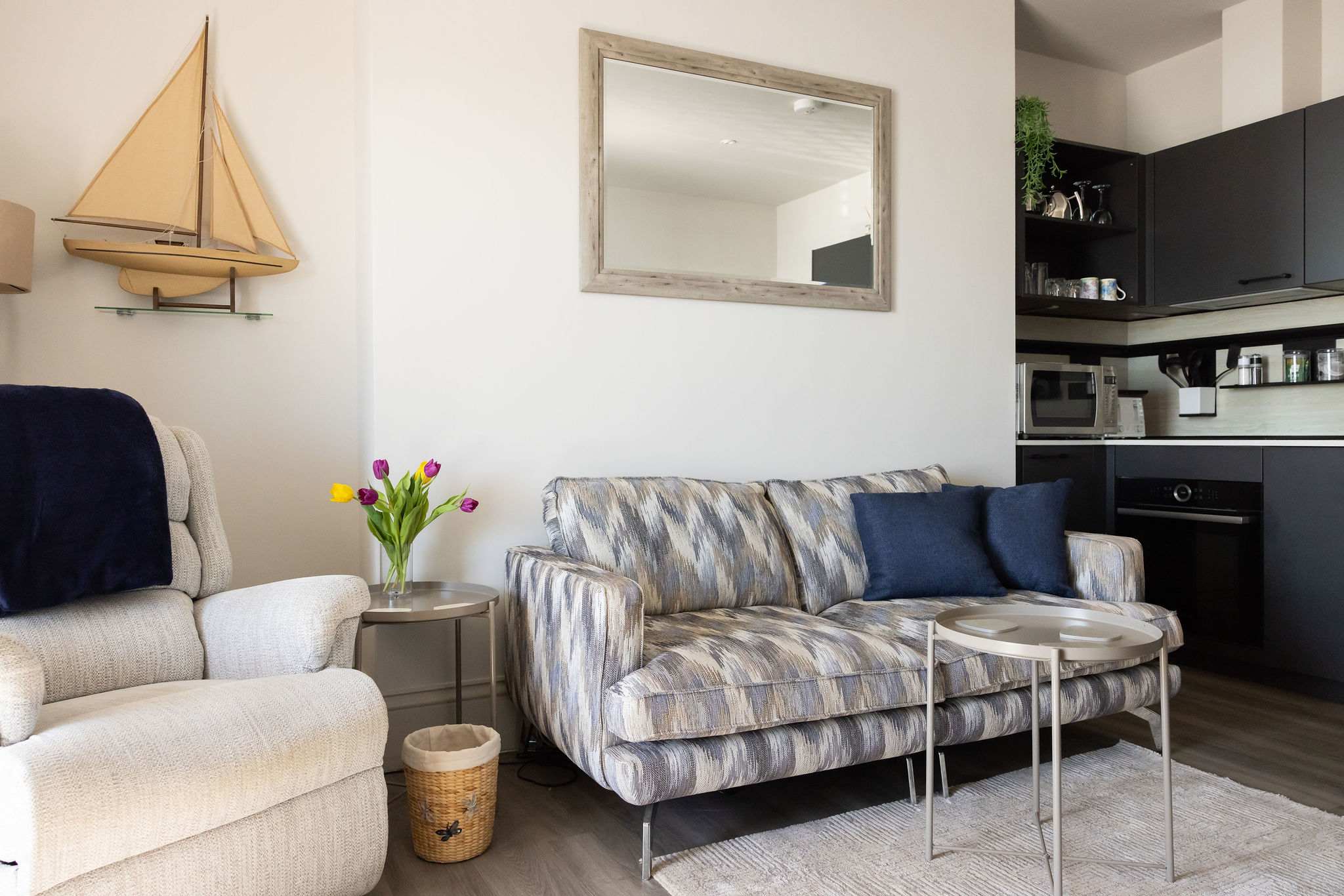 Bright, welcoming interiors offer a comfortable base moments from the beach and town centre.