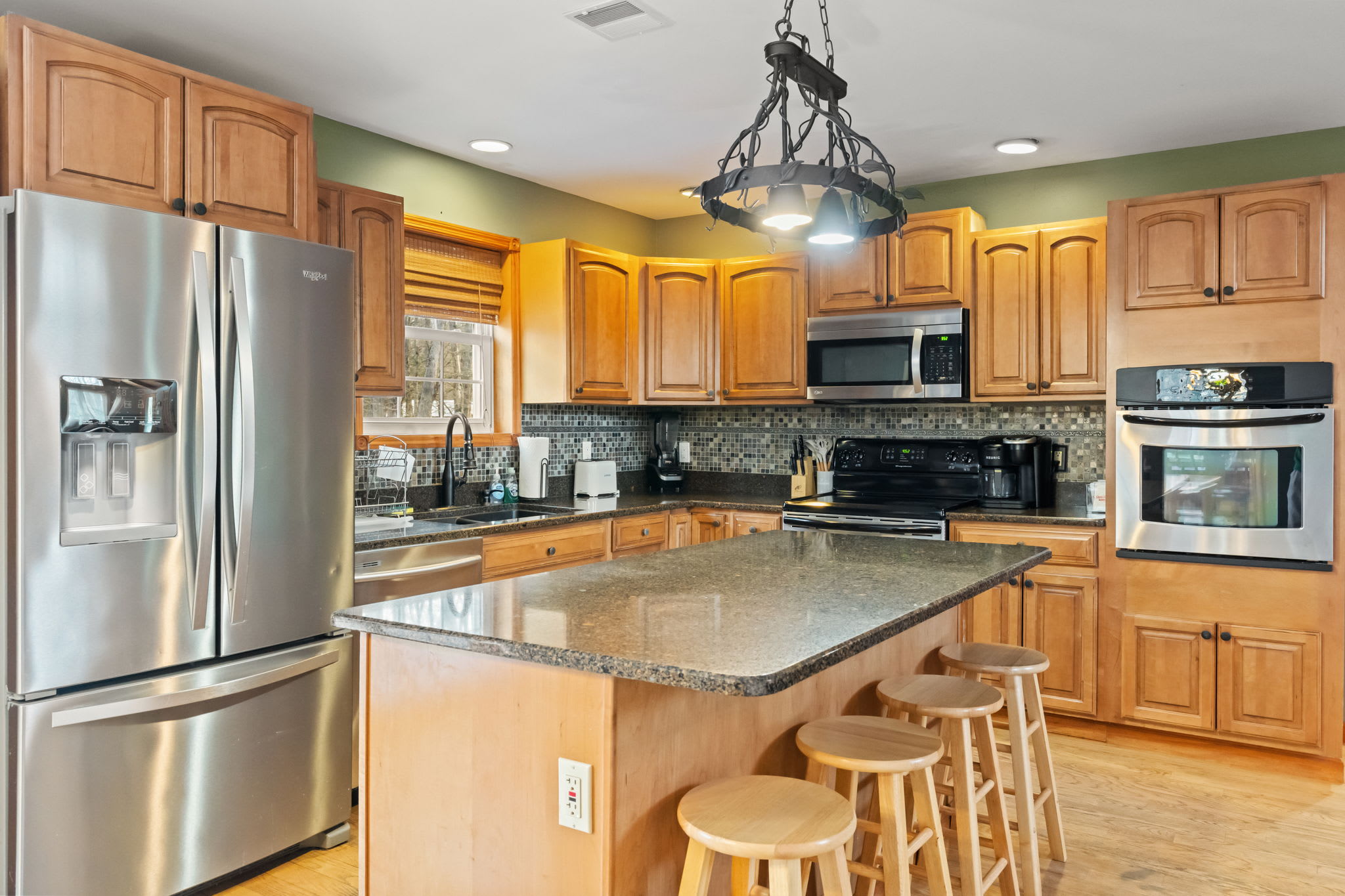 The kitchen island seats four for quick bites or morning coffee