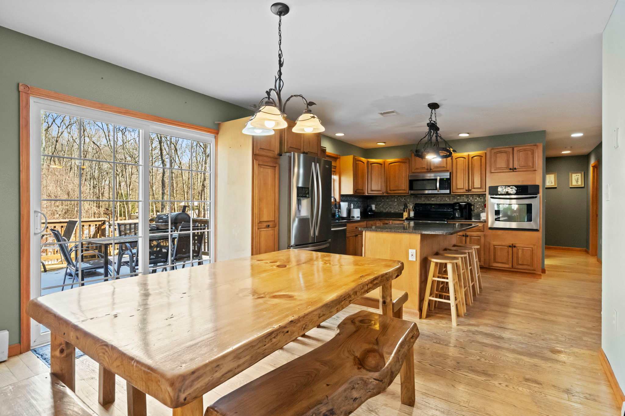 From the dining table, step right out to the grill and deck