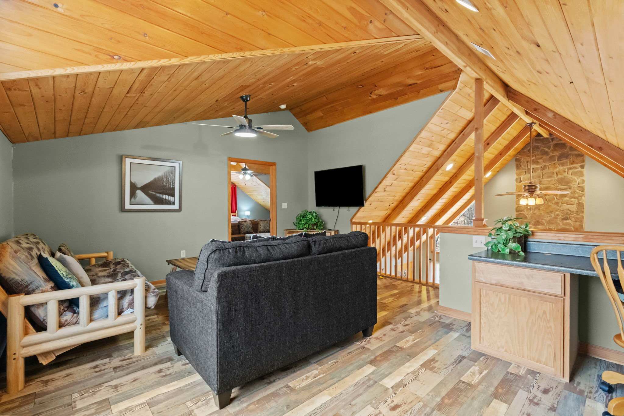 Cozy up on the sofa with mountain views and wildlife-themed accents