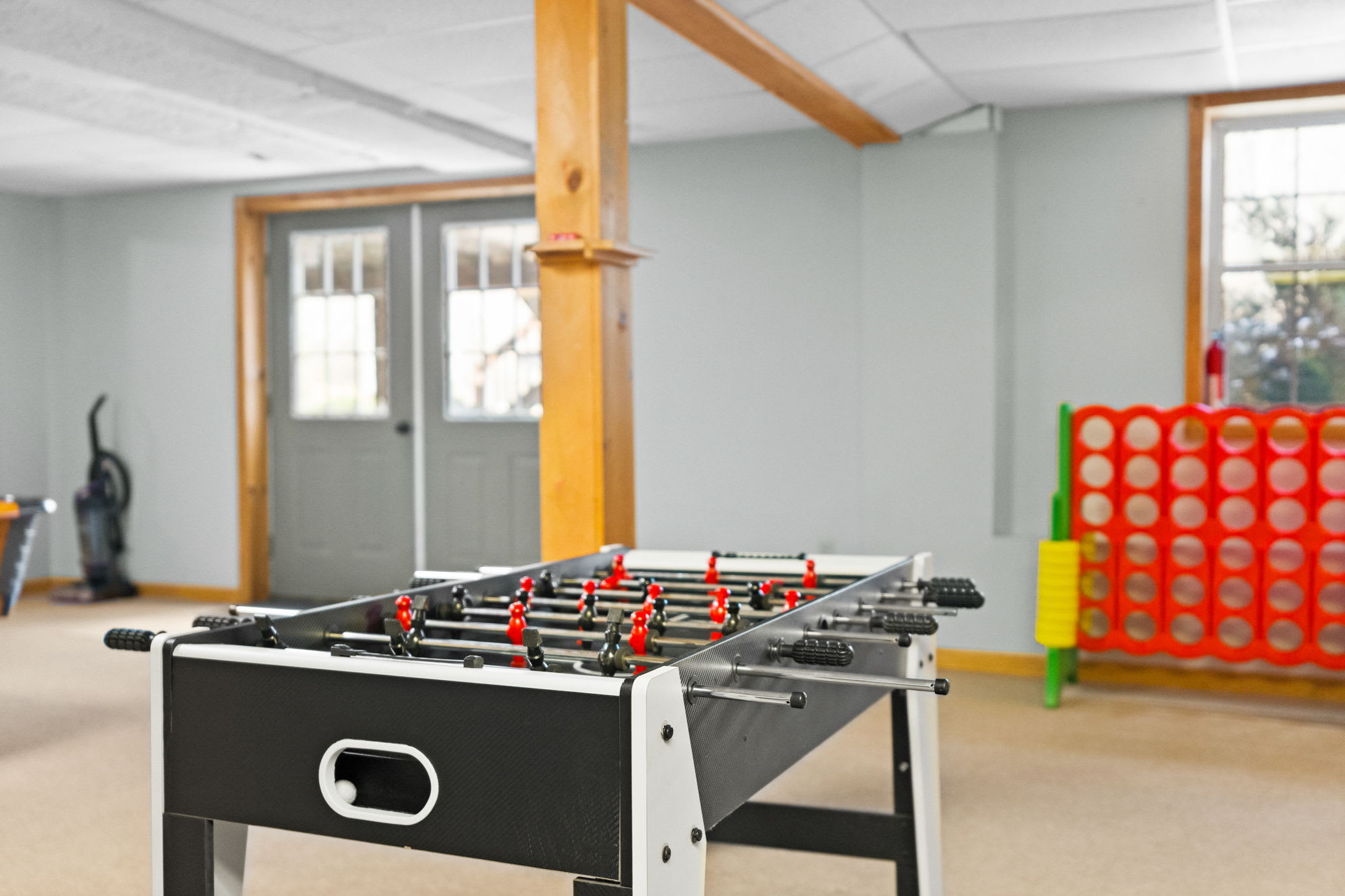 Foosball and party games keep the fun going in the colorful lower-level game area