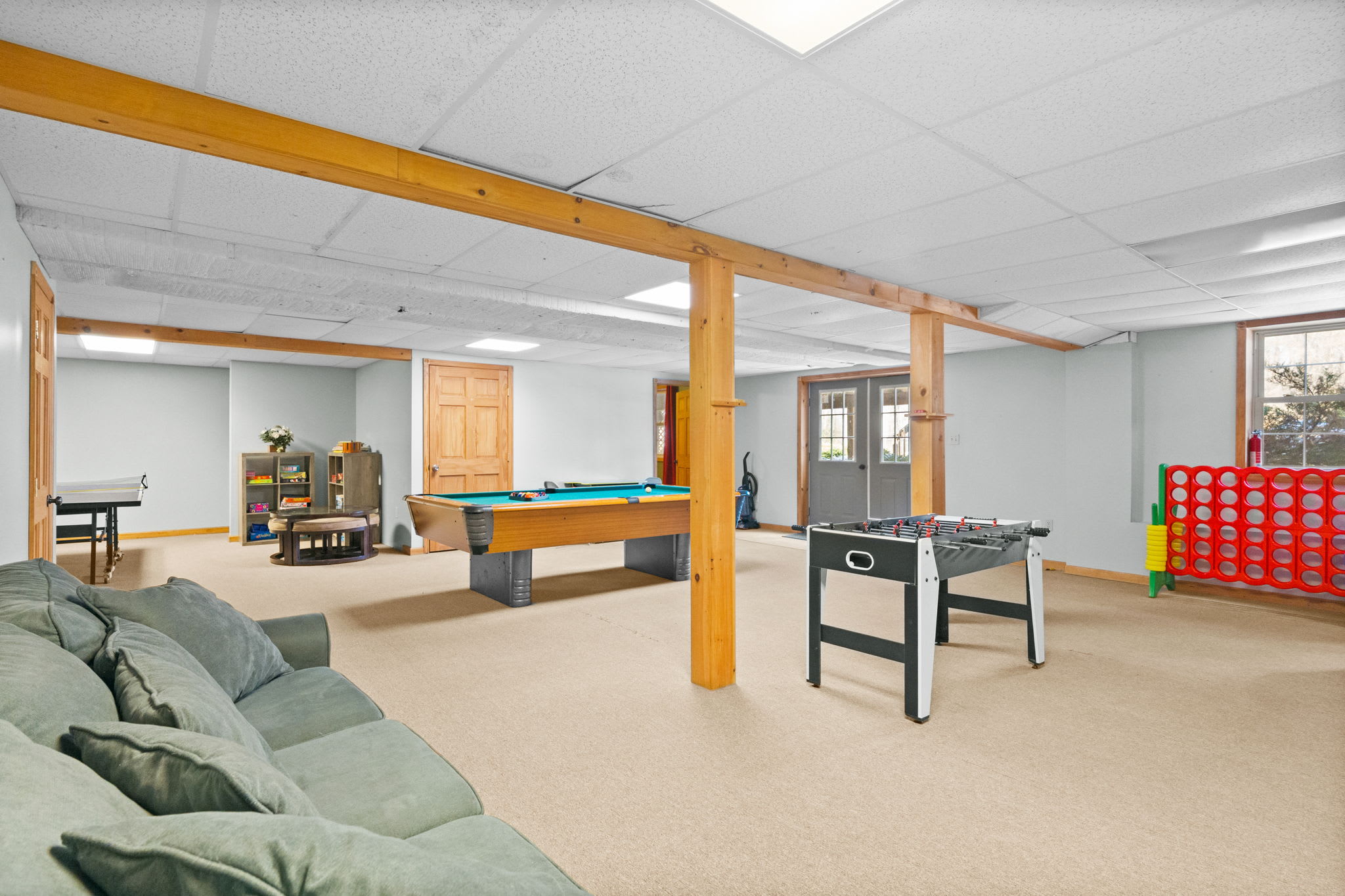 Gather the group in the game room lounge with comfortable seating and open layout