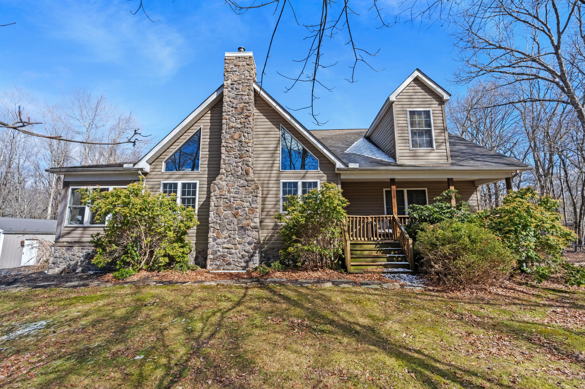 Welcome to your Pocono cabin retreat nestled among the trees