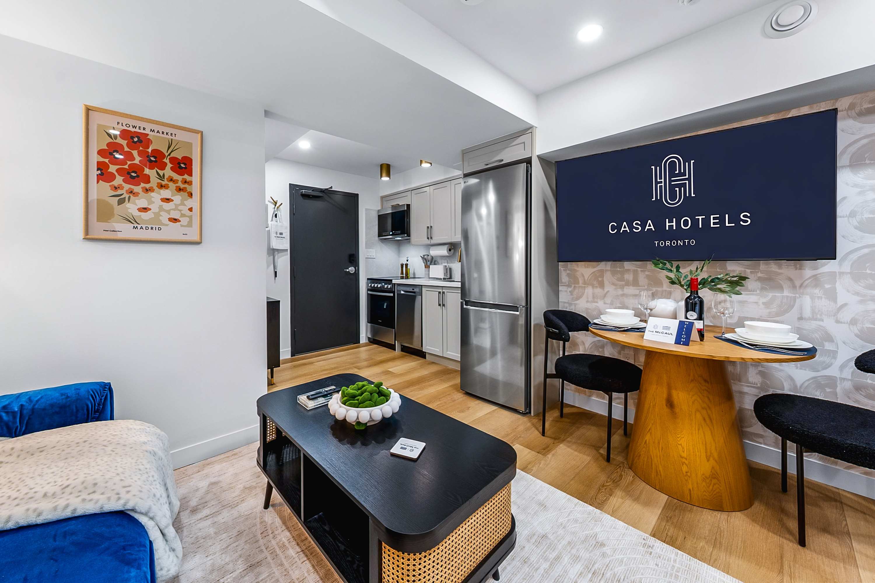 Open living space connecting the lounge, dining, and kitchen