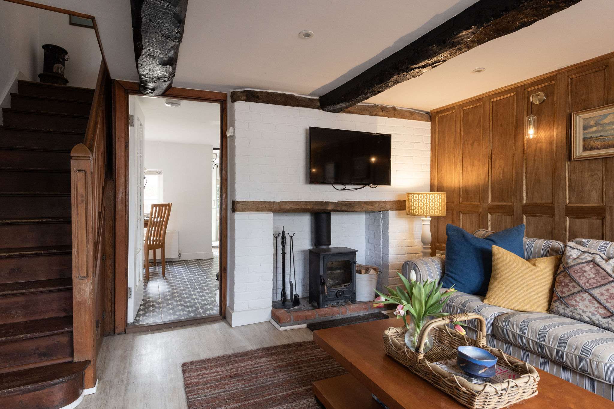 Cosy up by the log burner after a day by the sea