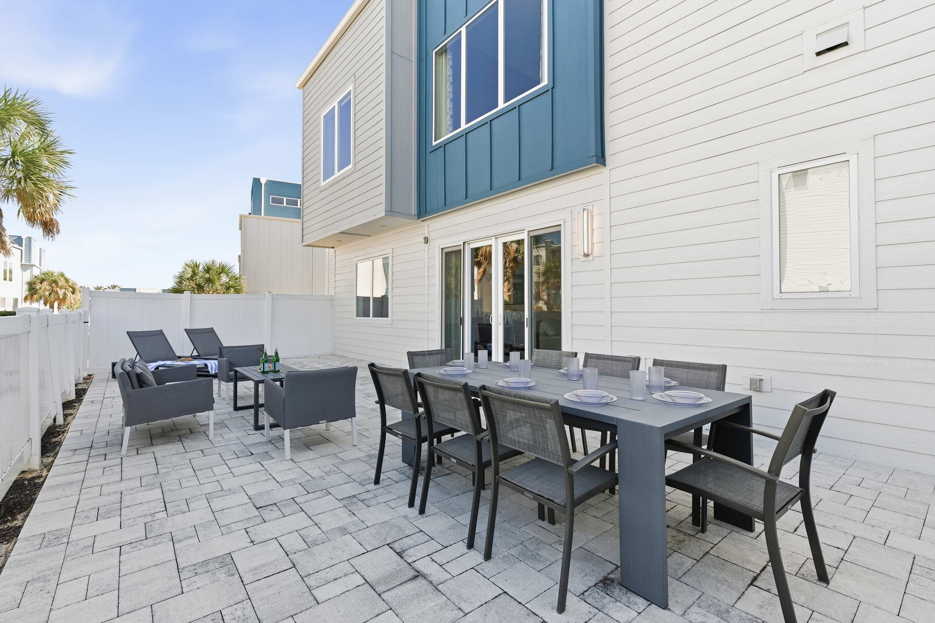 Outdoor patio with dining and lounge seating for group gatherings