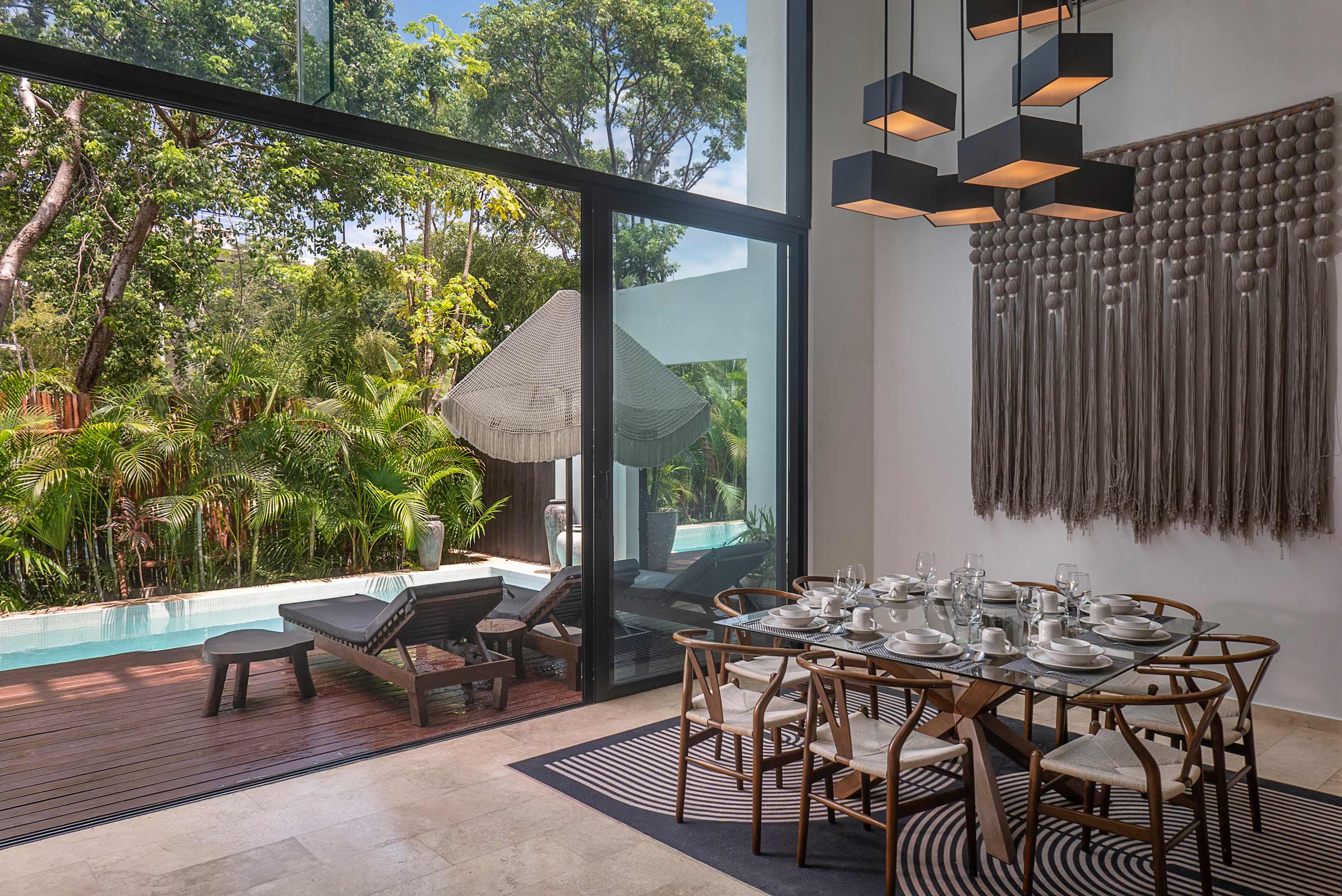 Living room & dining area with pool view