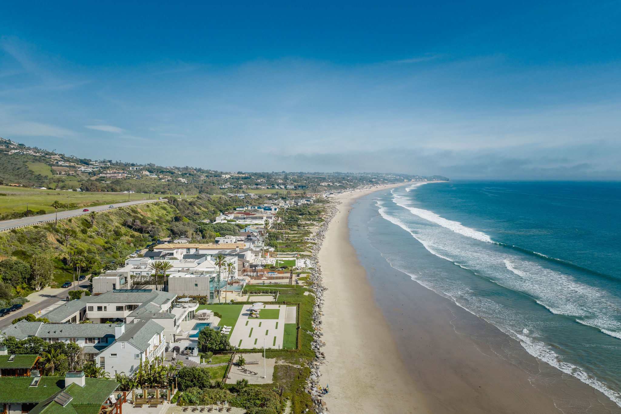Malibu coastline aerial showcasing Broad Beach and surrounding estates.