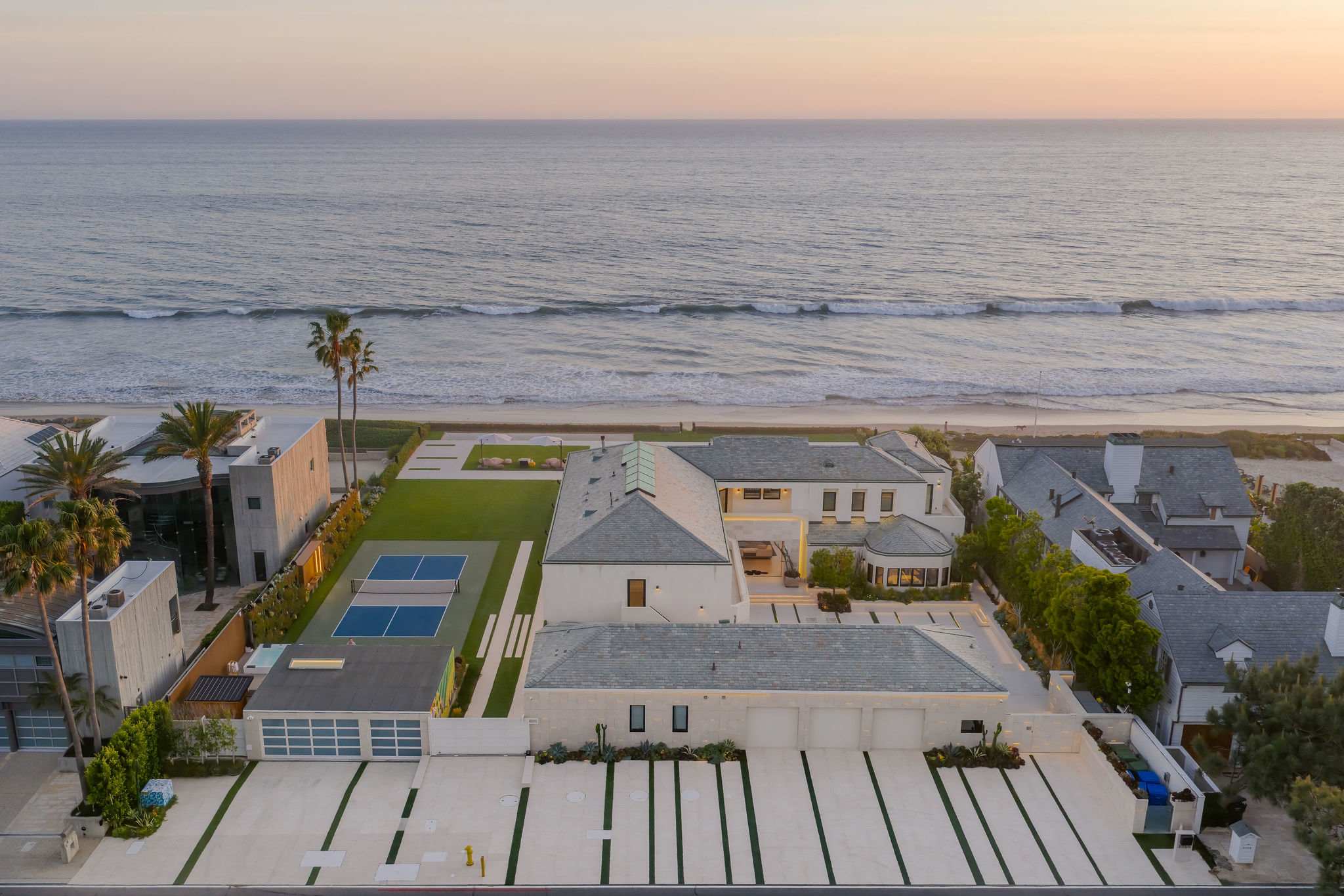 Broad Beach oceanfront estate with 7,600 sq ft across main and guest house.