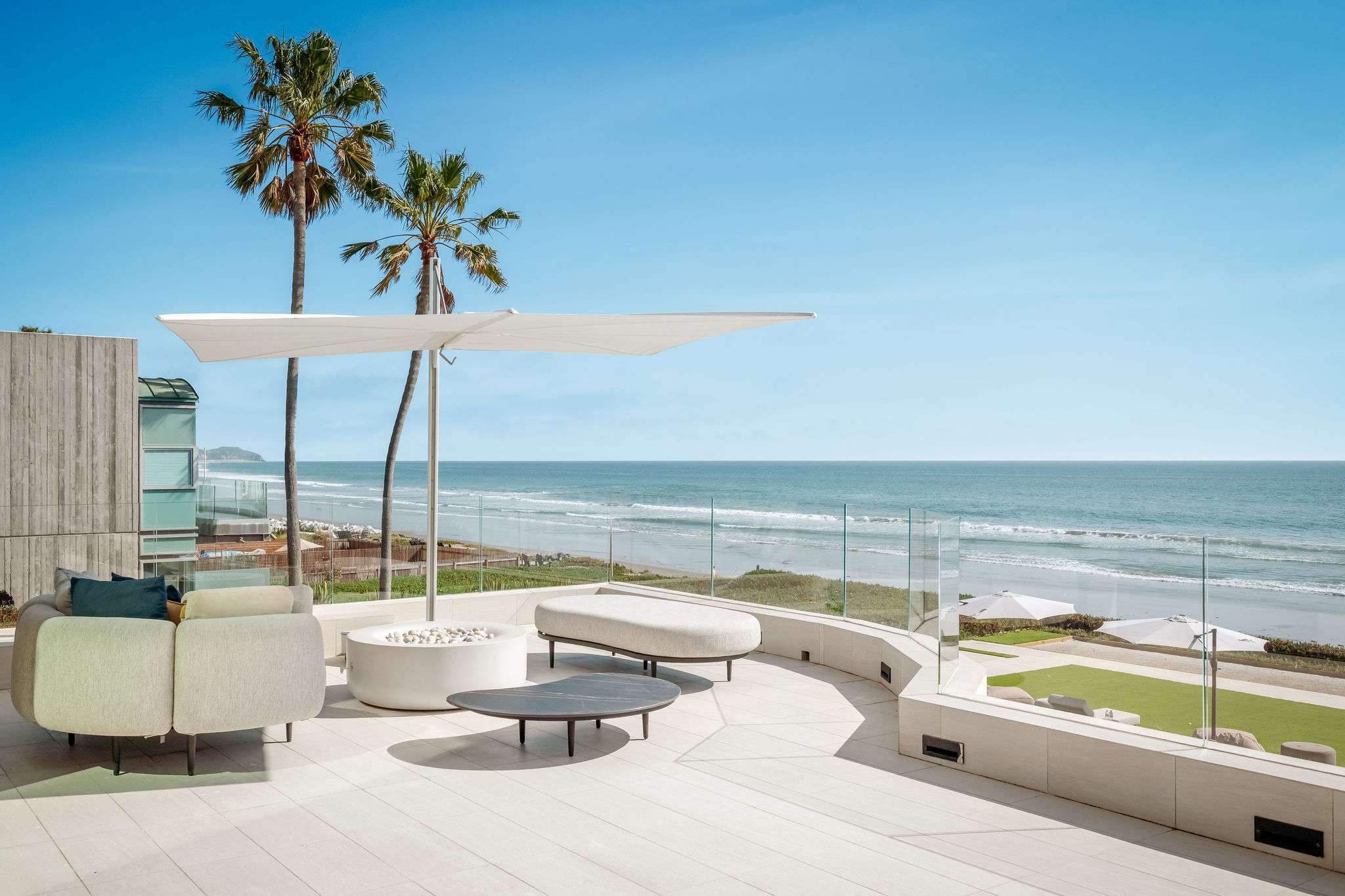 Take in uninterrupted Pacific Ocean views from the outdoor lounge.