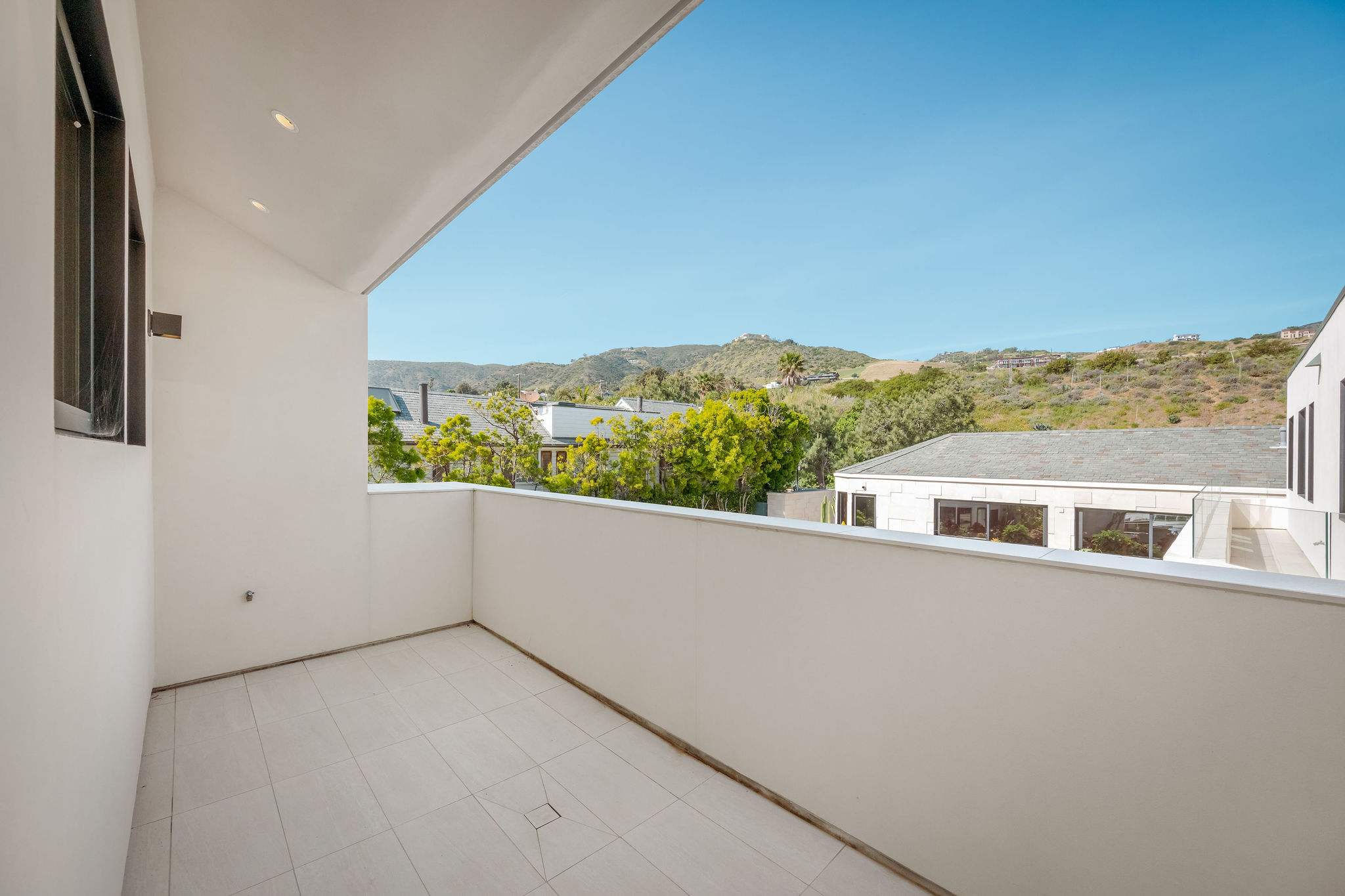 Private terrace with elevated Malibu hillside views and open-air space.