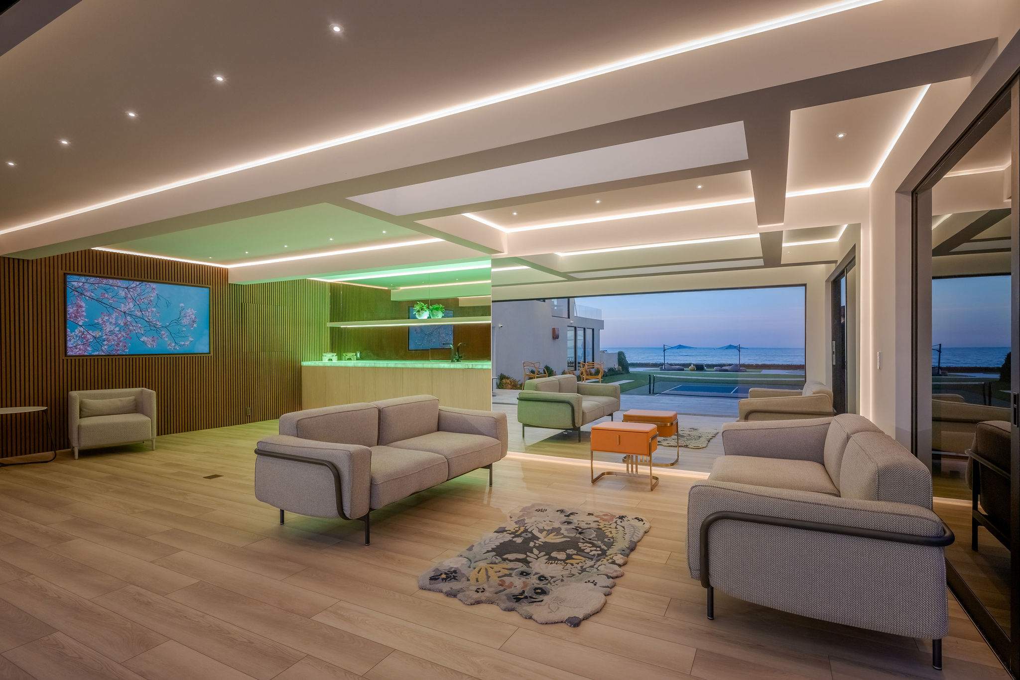 Spend the evening across a fully open living space with the oceanfront beyond.