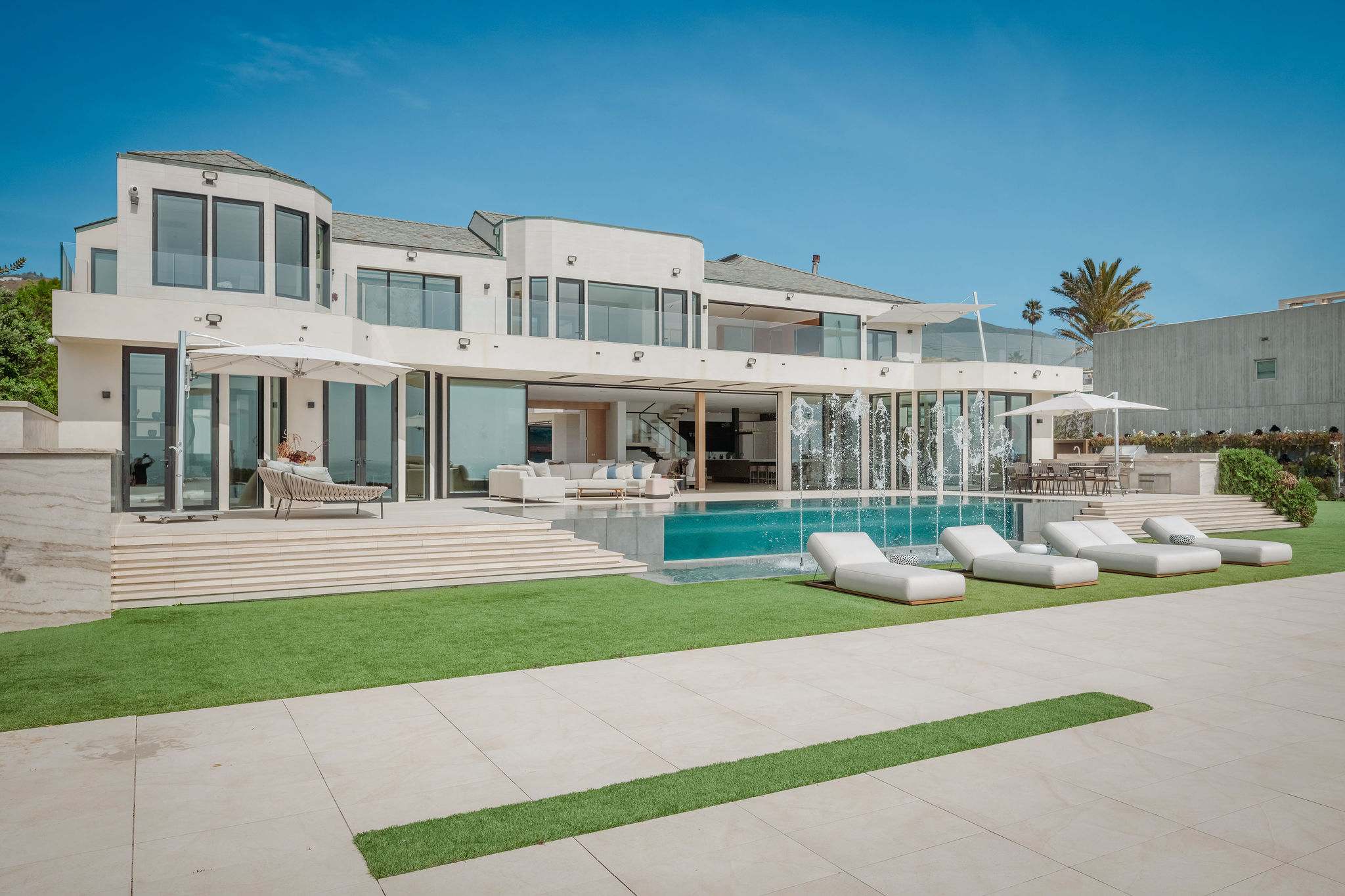 Move between pool, lawn, and direct beach access without leaving the space.