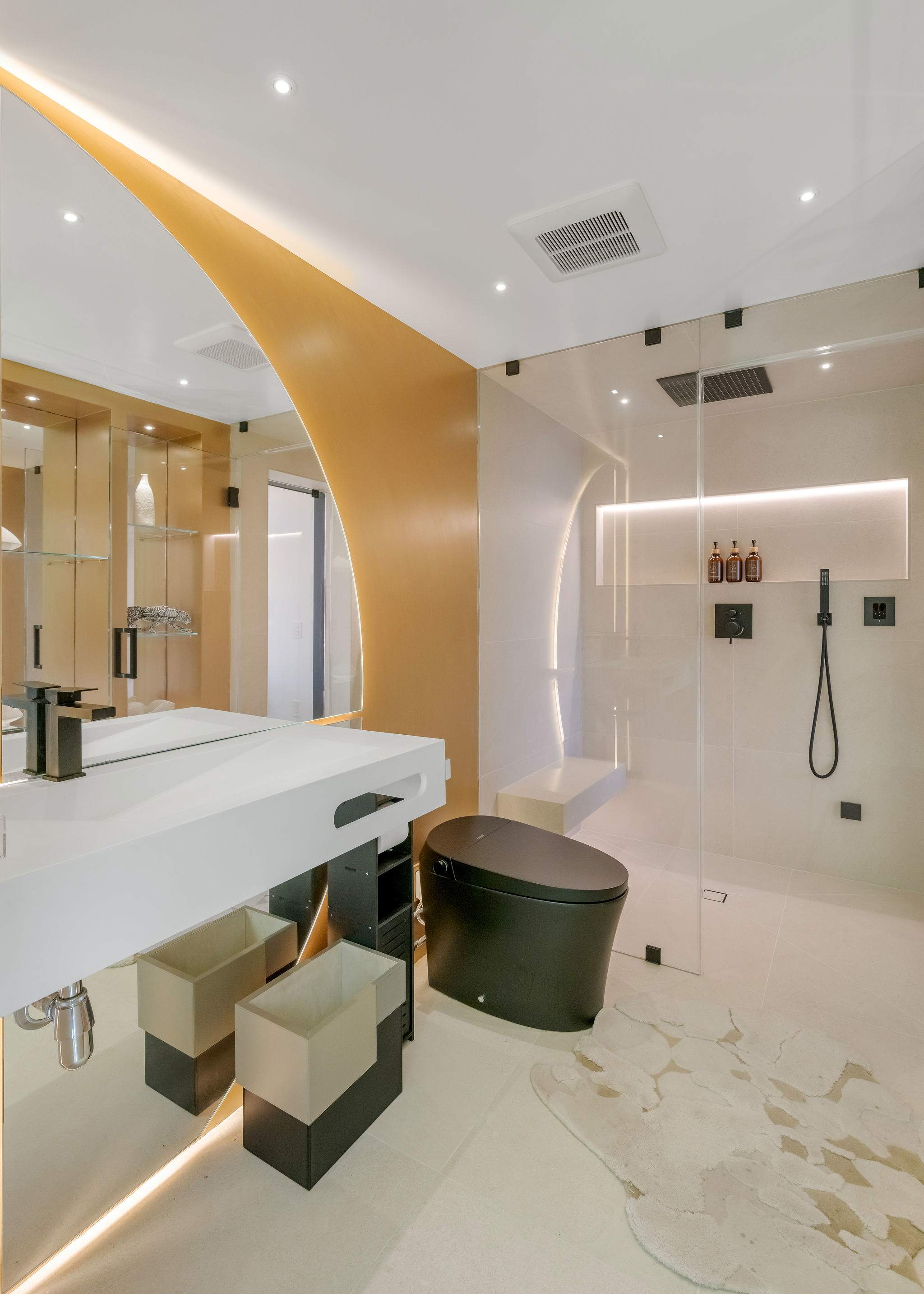 Spa-style bathroom with dual vanity, full-length mirror, and premium finishes.