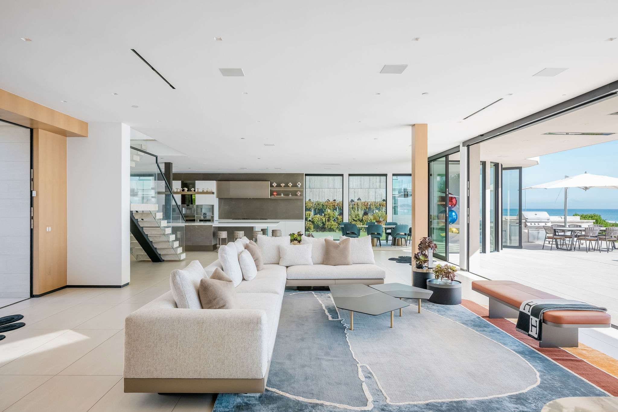 Sit back in an open living space that runs directly out to oceanfront views.