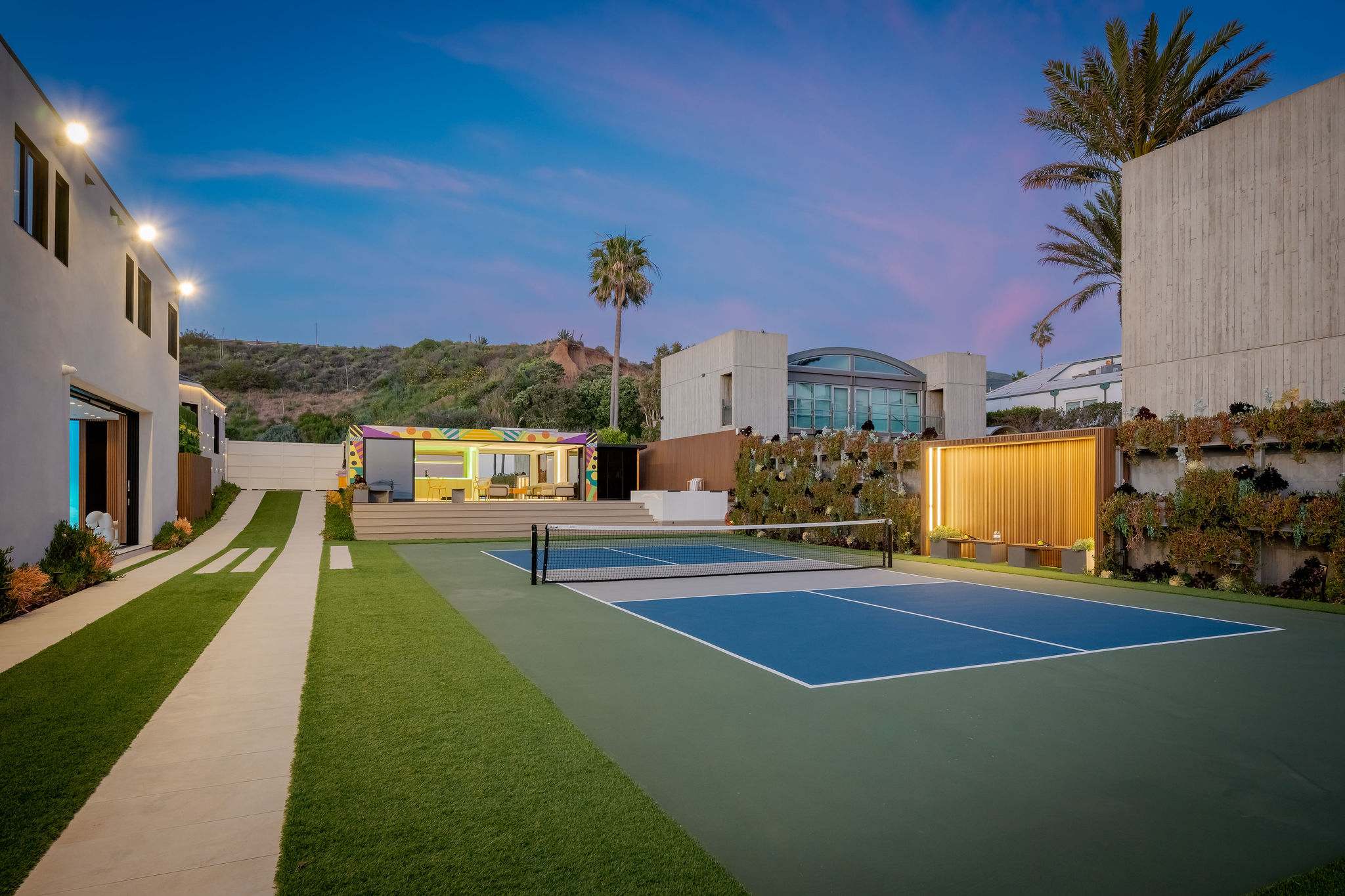A private sport court set within the property, ready any time of day.