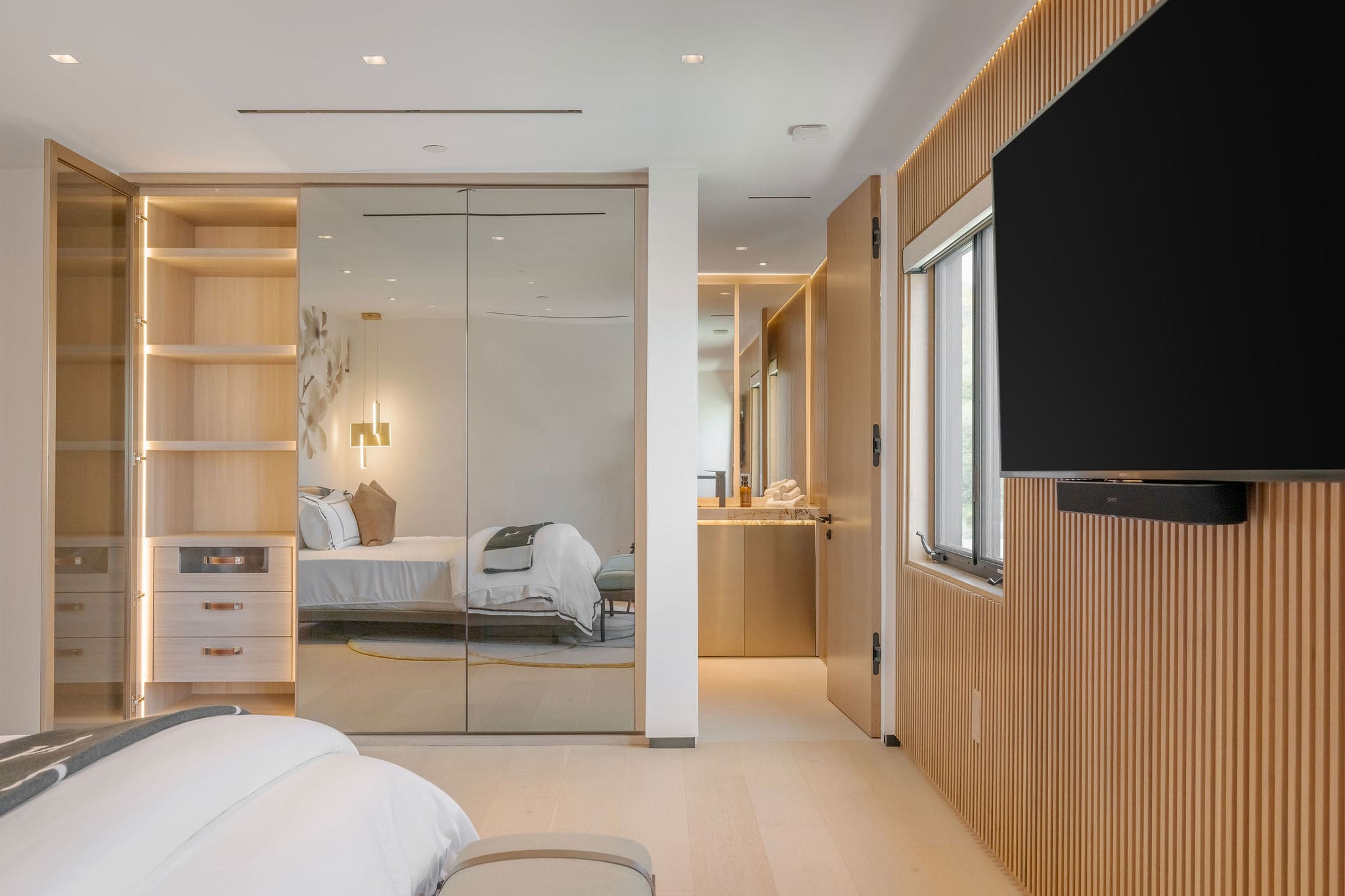 Wake up and move straight through your bedroom suite into a full dressing area and private bathroom.