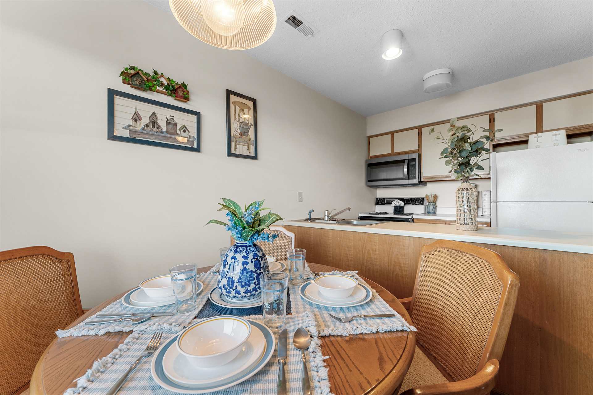Make mealtime memories together at the dining table, seating 4​