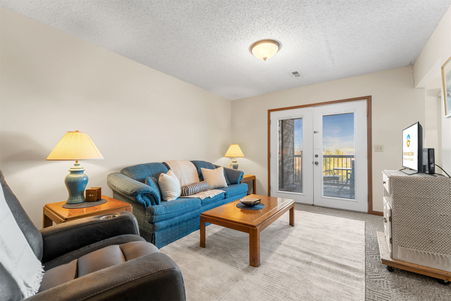 Curl up in the inviting living room & enjoy a movie night at home​