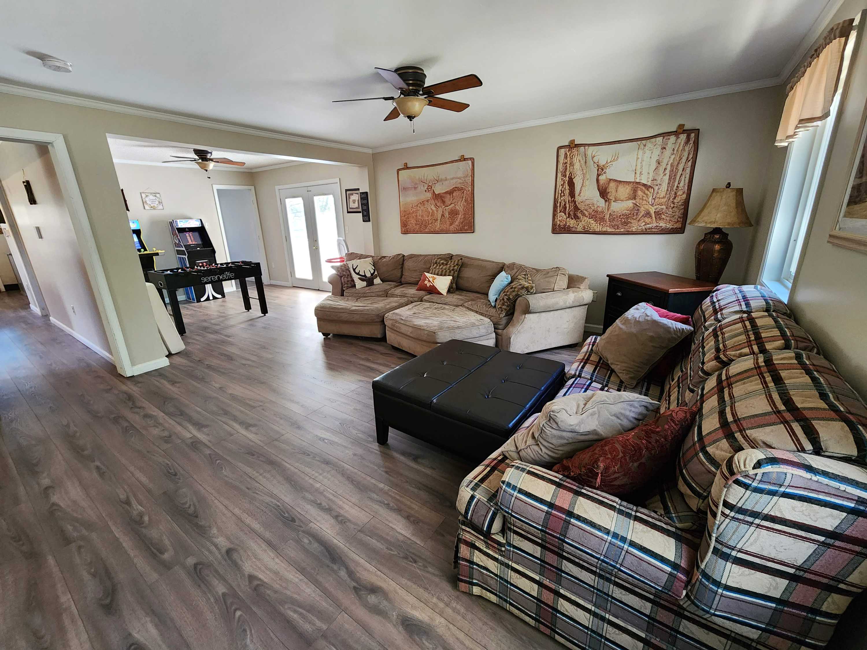 Tall A-frame windows fill the great room with natural light all day long