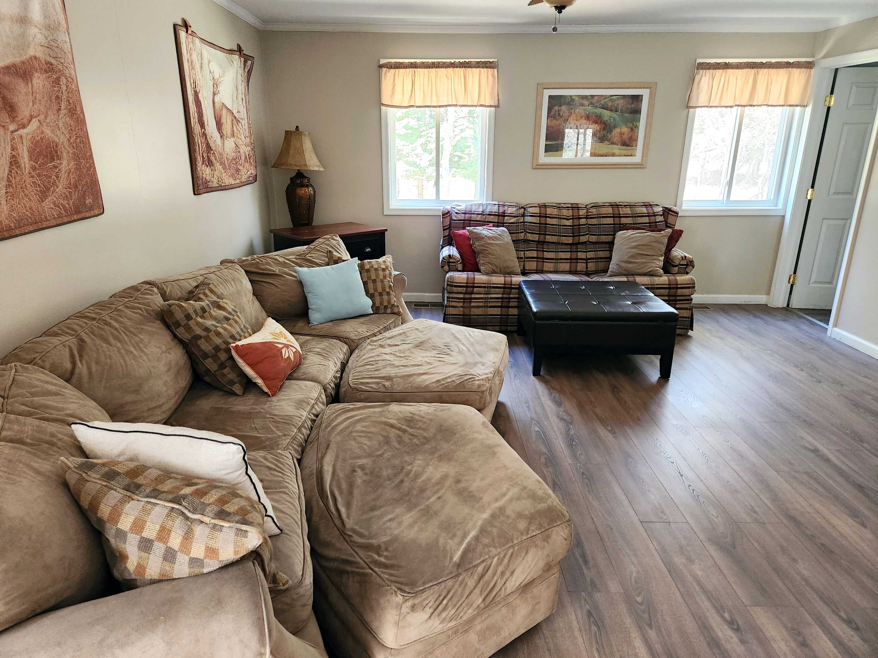 A cozy den with plaid accents for unwinding after a full day outdoors