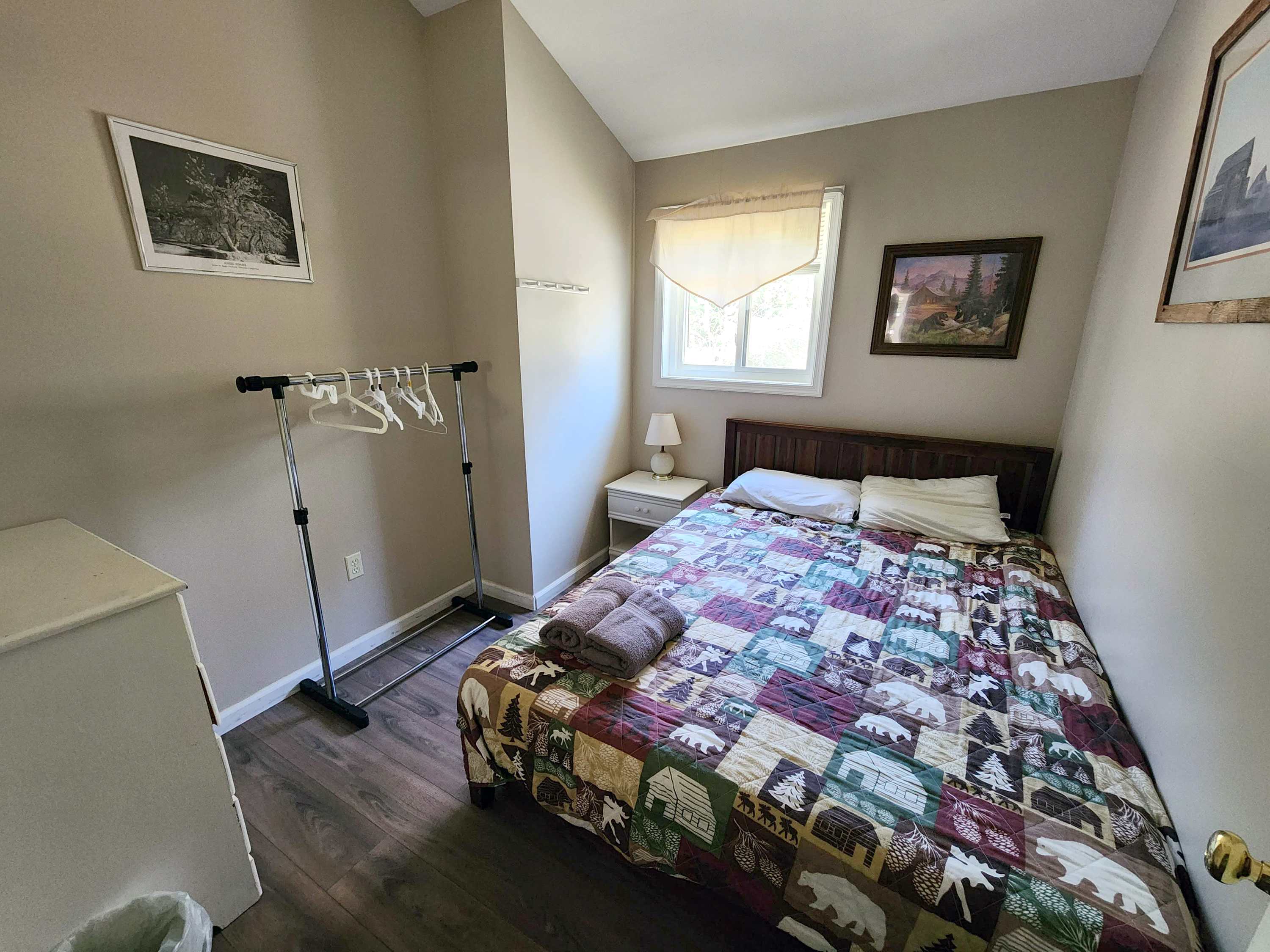 Quiet bedroom with soft quilted bedding for slow, peaceful mornings