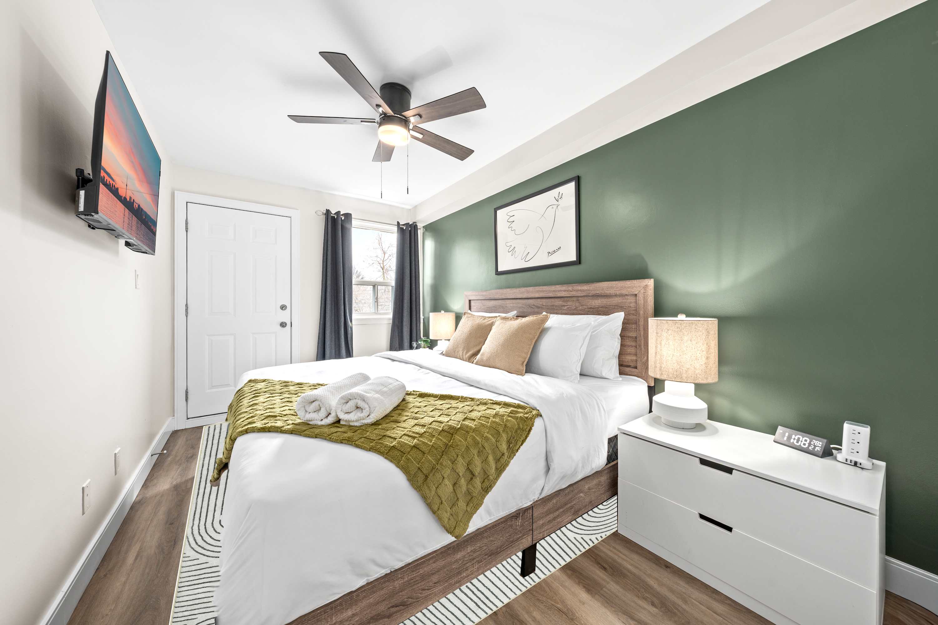 Drift off on a plush king bed while catching your favorite series