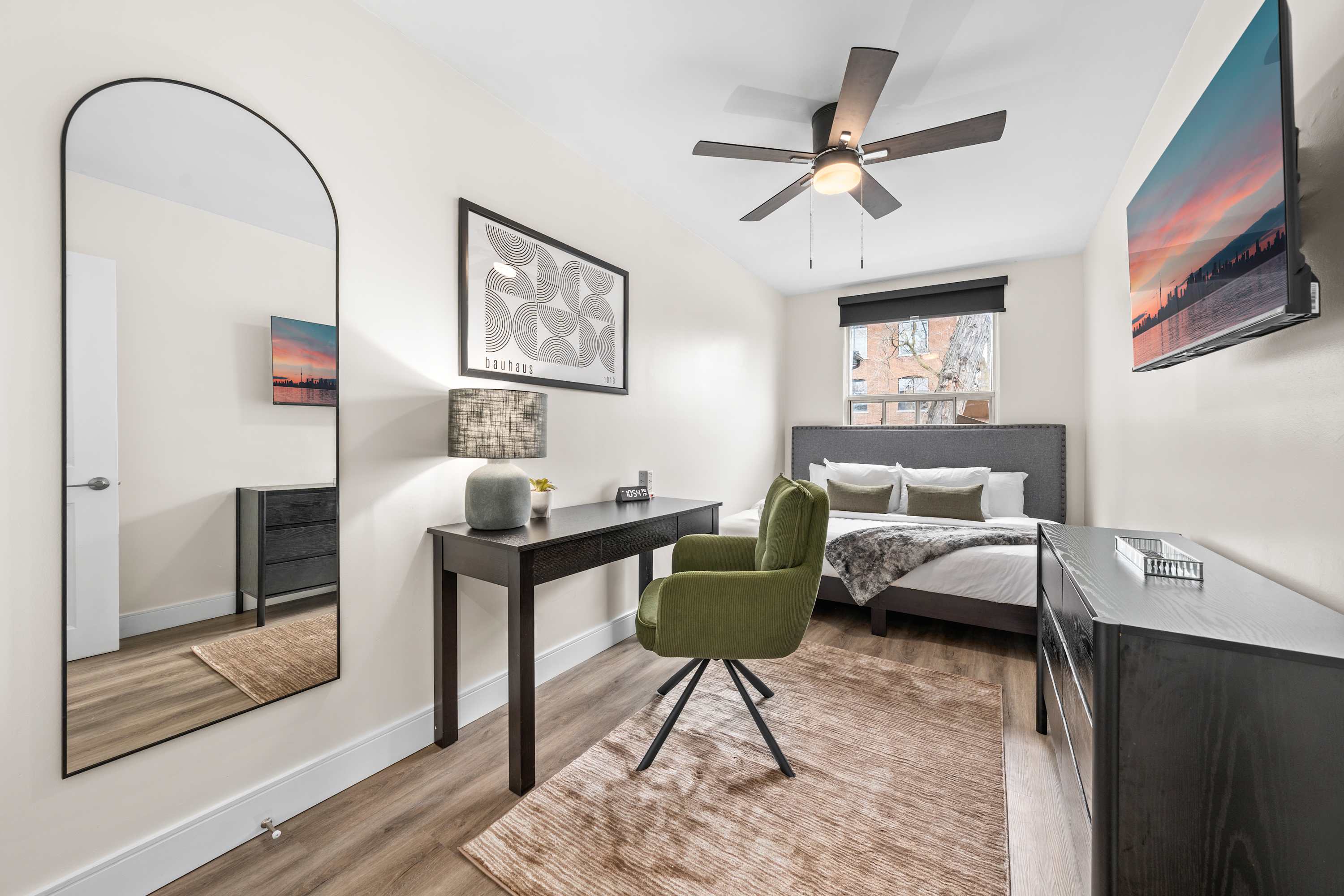 Queen bedroom with study area and cozy comfort