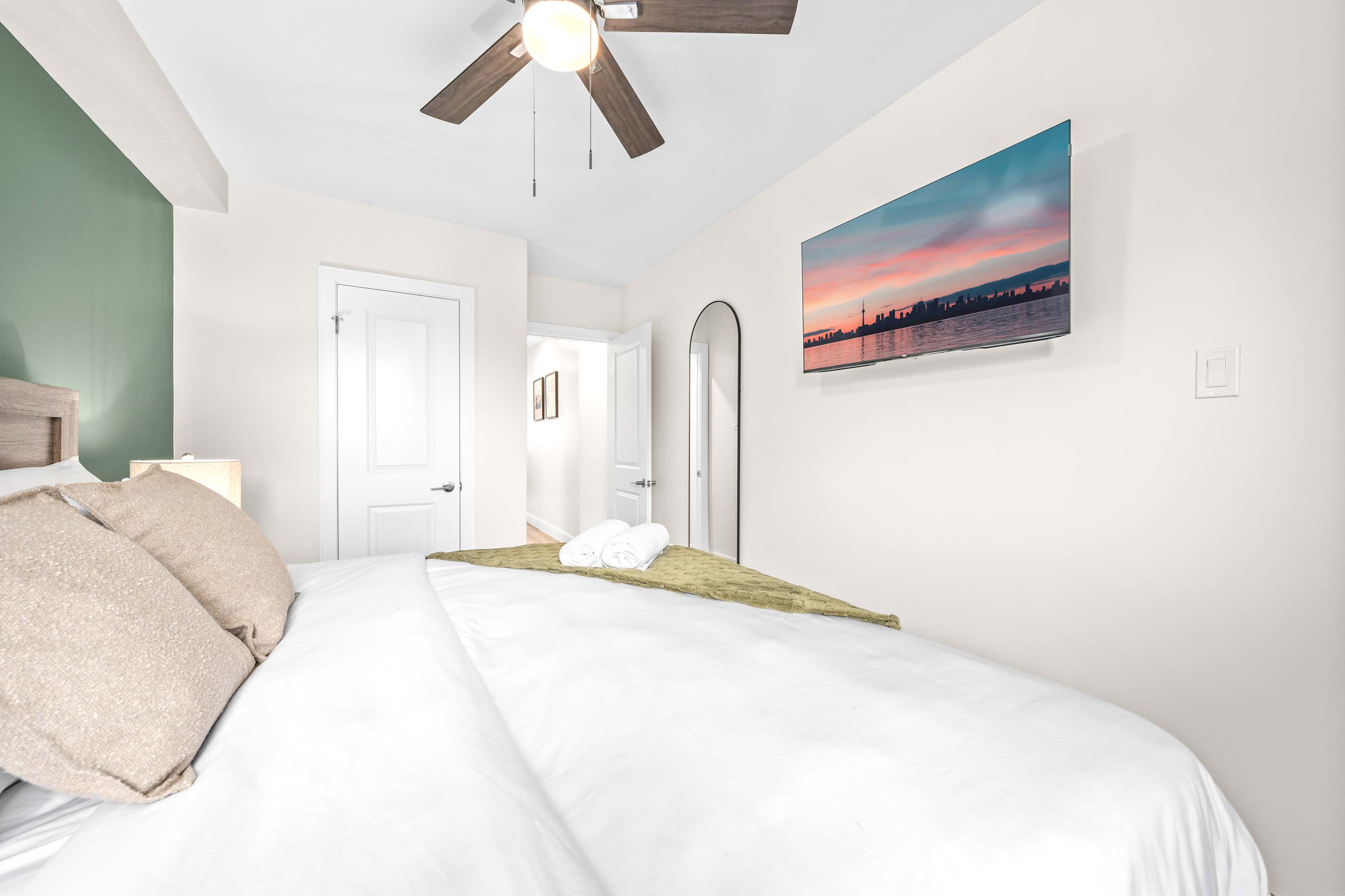 Drift into comfort on a king bed and catch your favorite shows