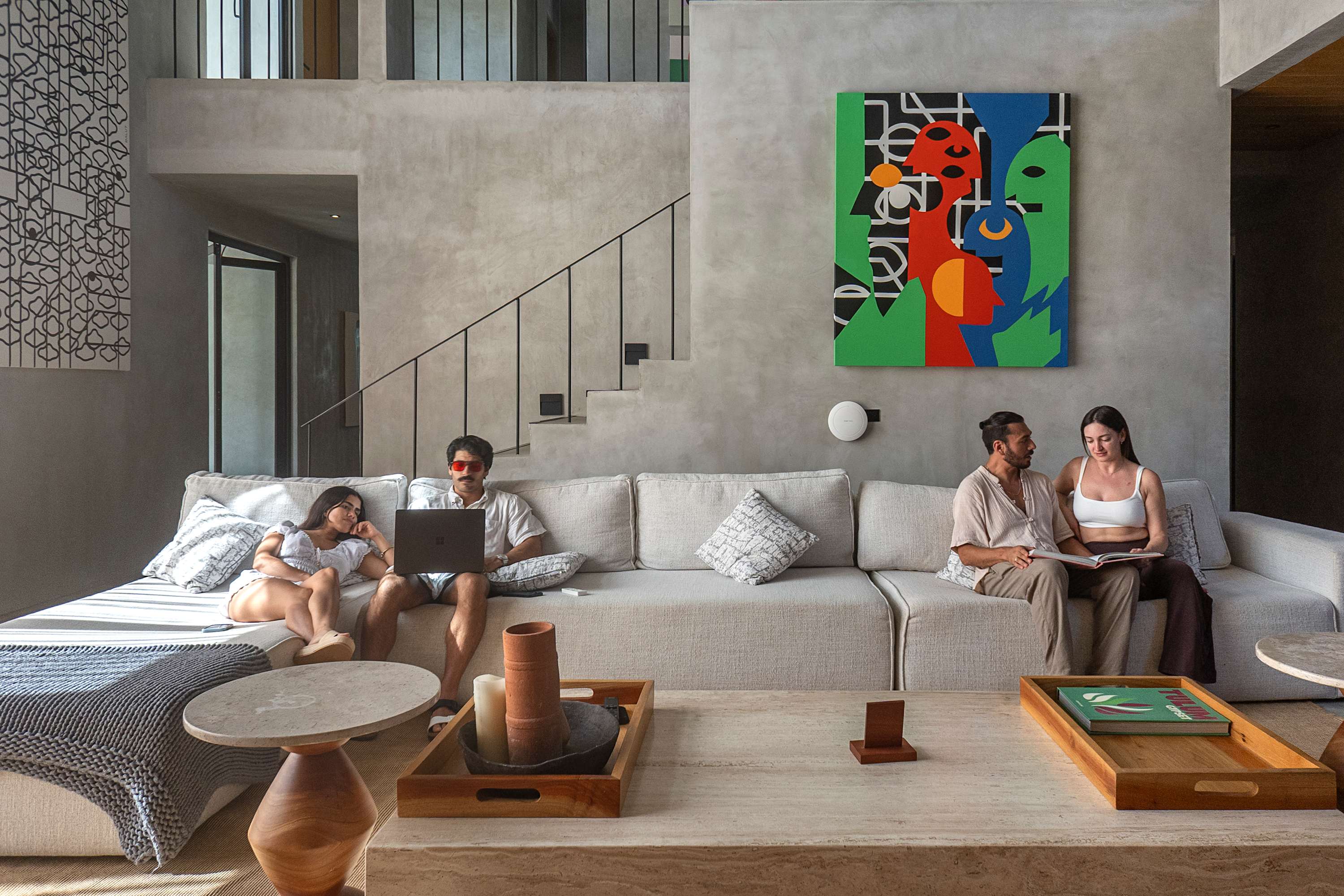 Expansive living room designed for both productivity and relaxation—ideal for working from home or socializing with friends.