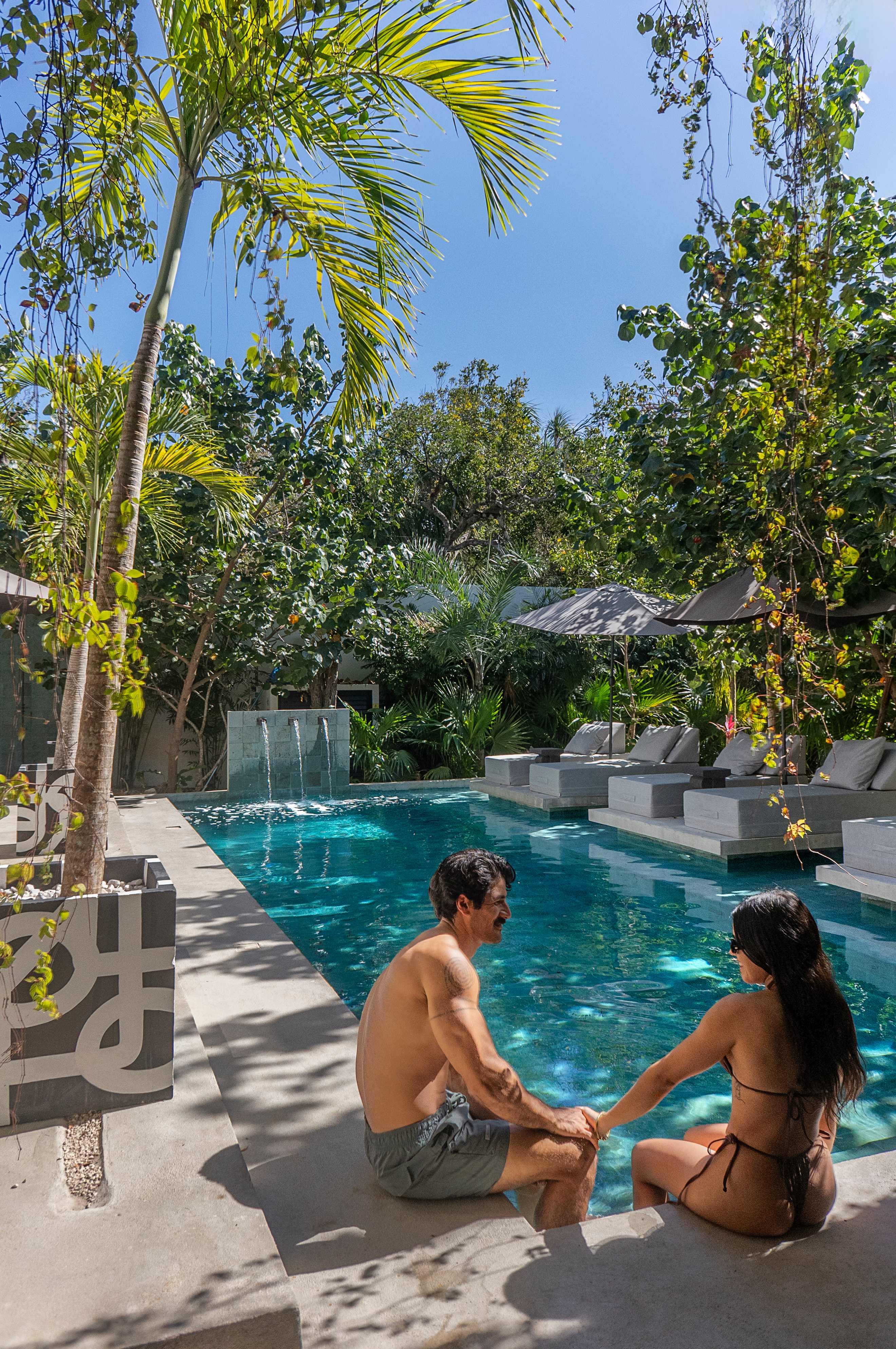 The pool area is designed for fun and relaxation