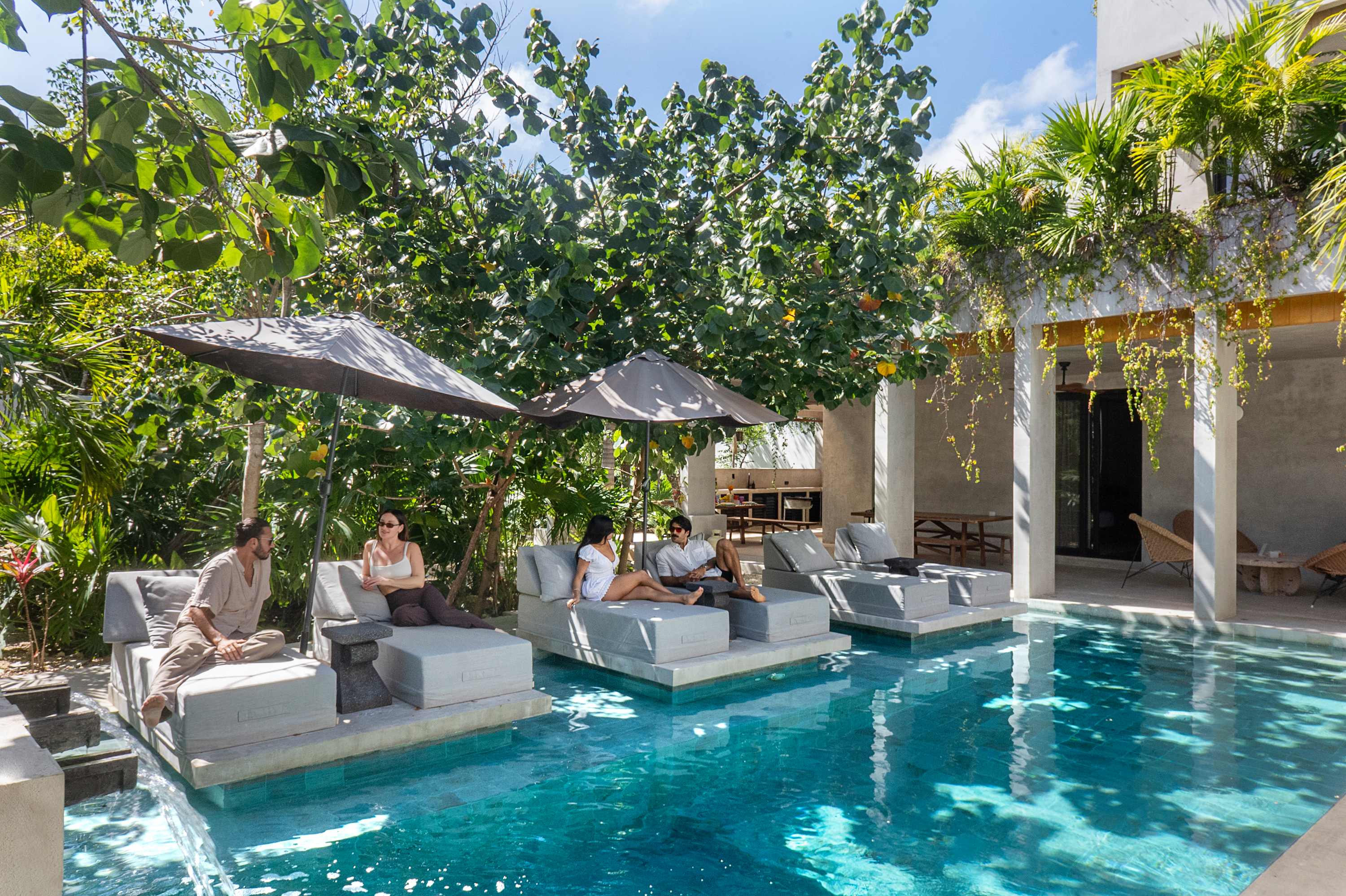 The pool area is designed for fun and relaxation