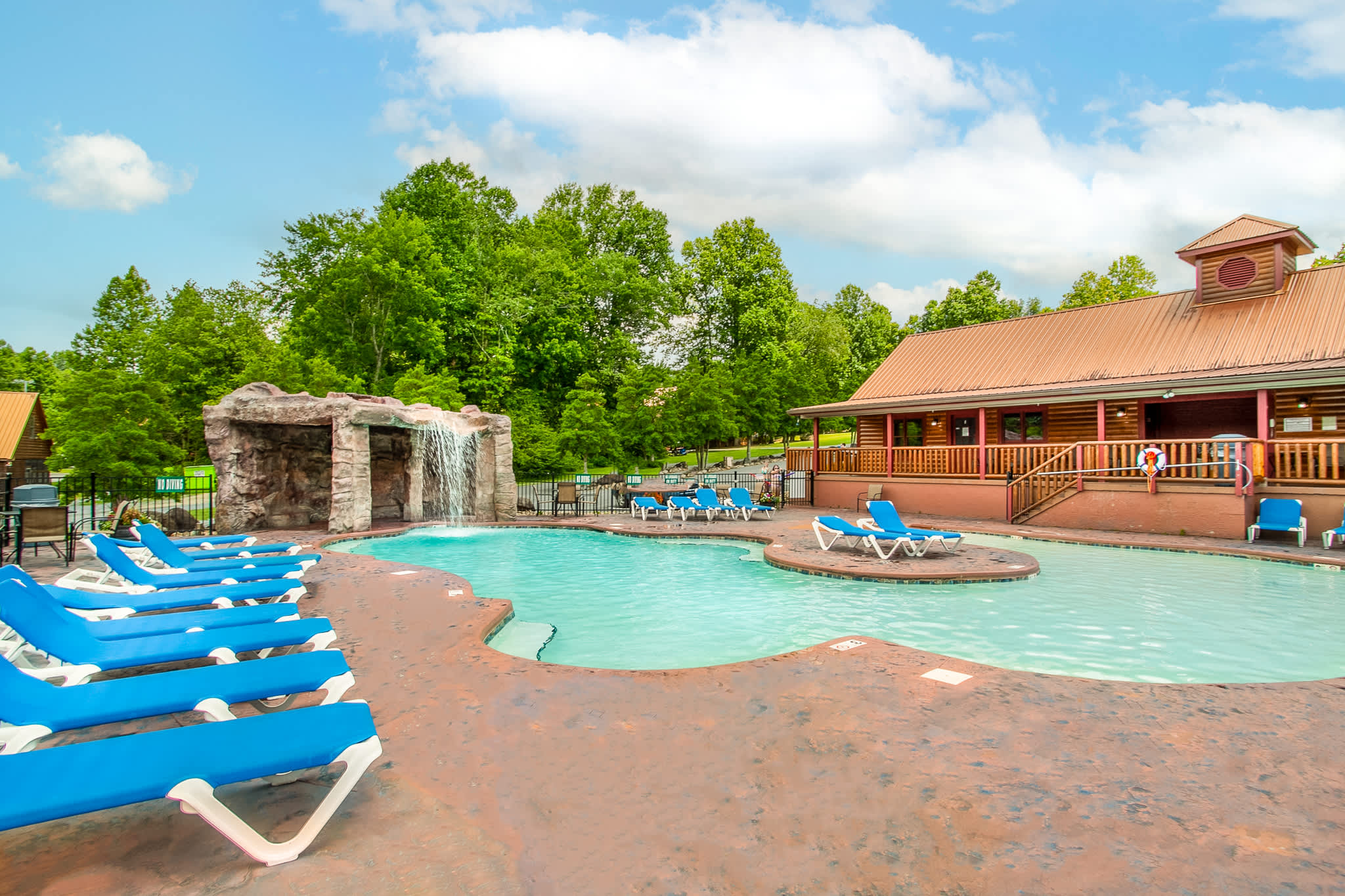 Community resort-style pool with a waterfall.