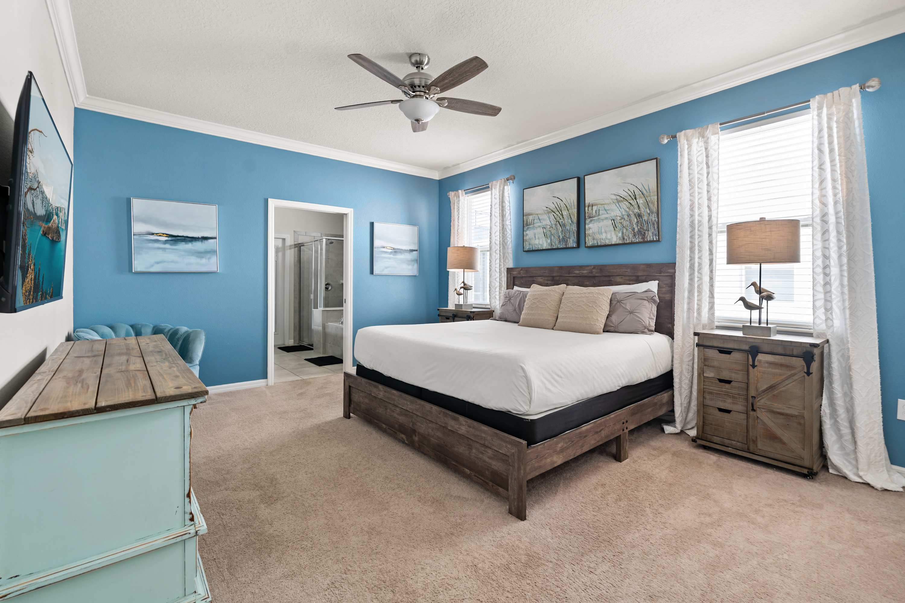 King-size bedroom with cozy linens and space to relax, unwind, and enjoy comfort