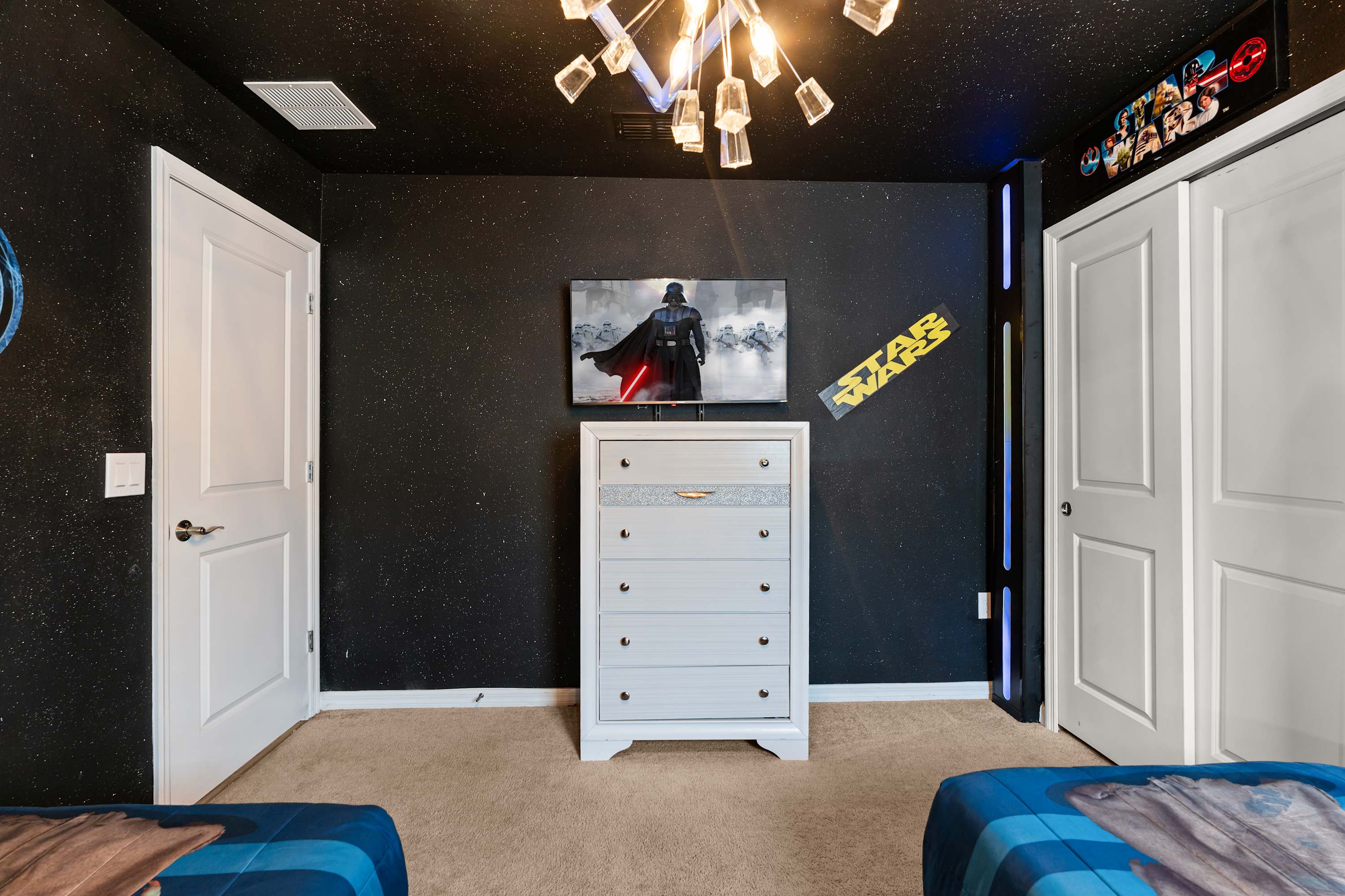 Star Wars room with 55-inch TV, perfect for young Jedi to watch shows and plan galactic battles