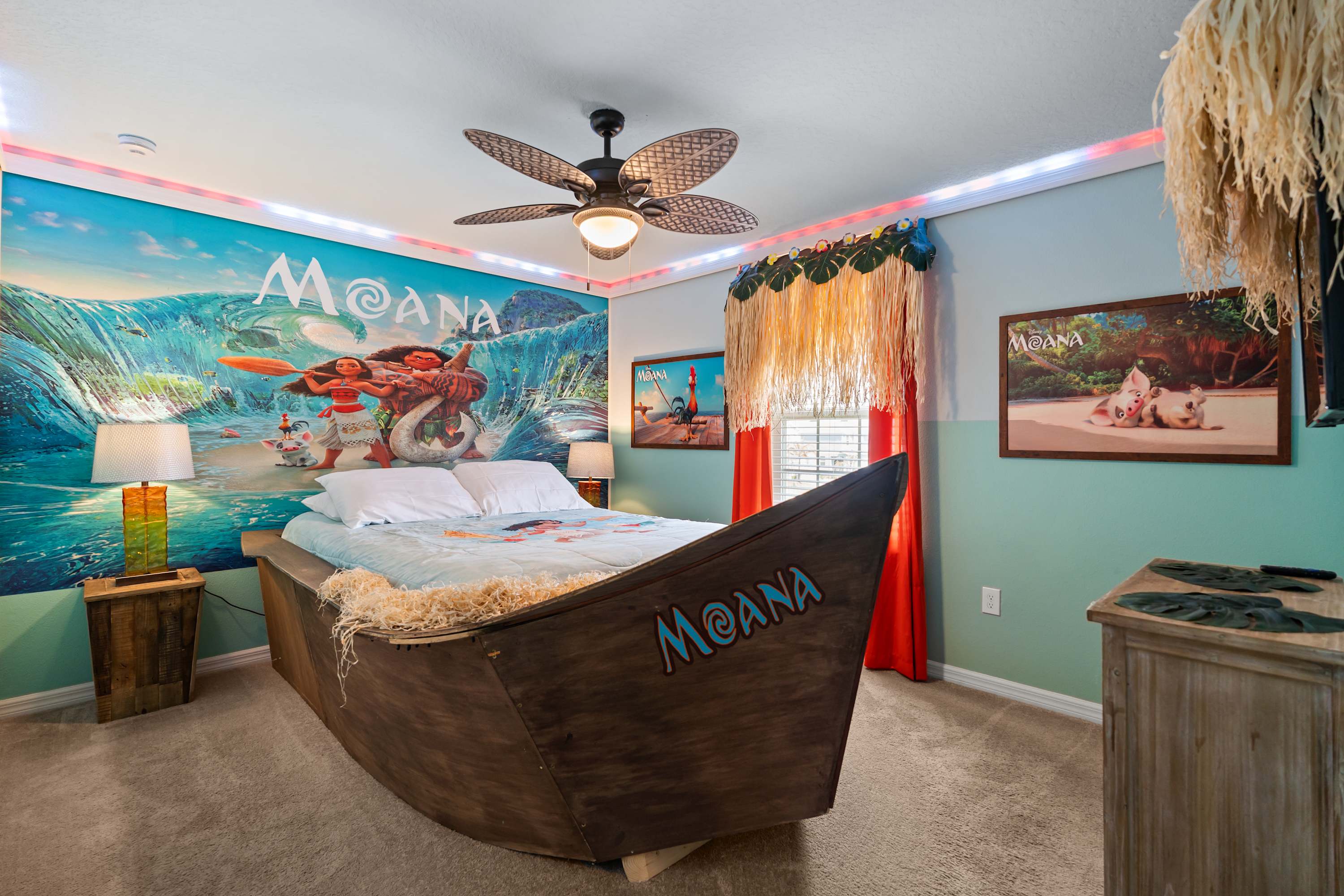 Moana room with a boat-shaped queen bed where kids can sail into adventure