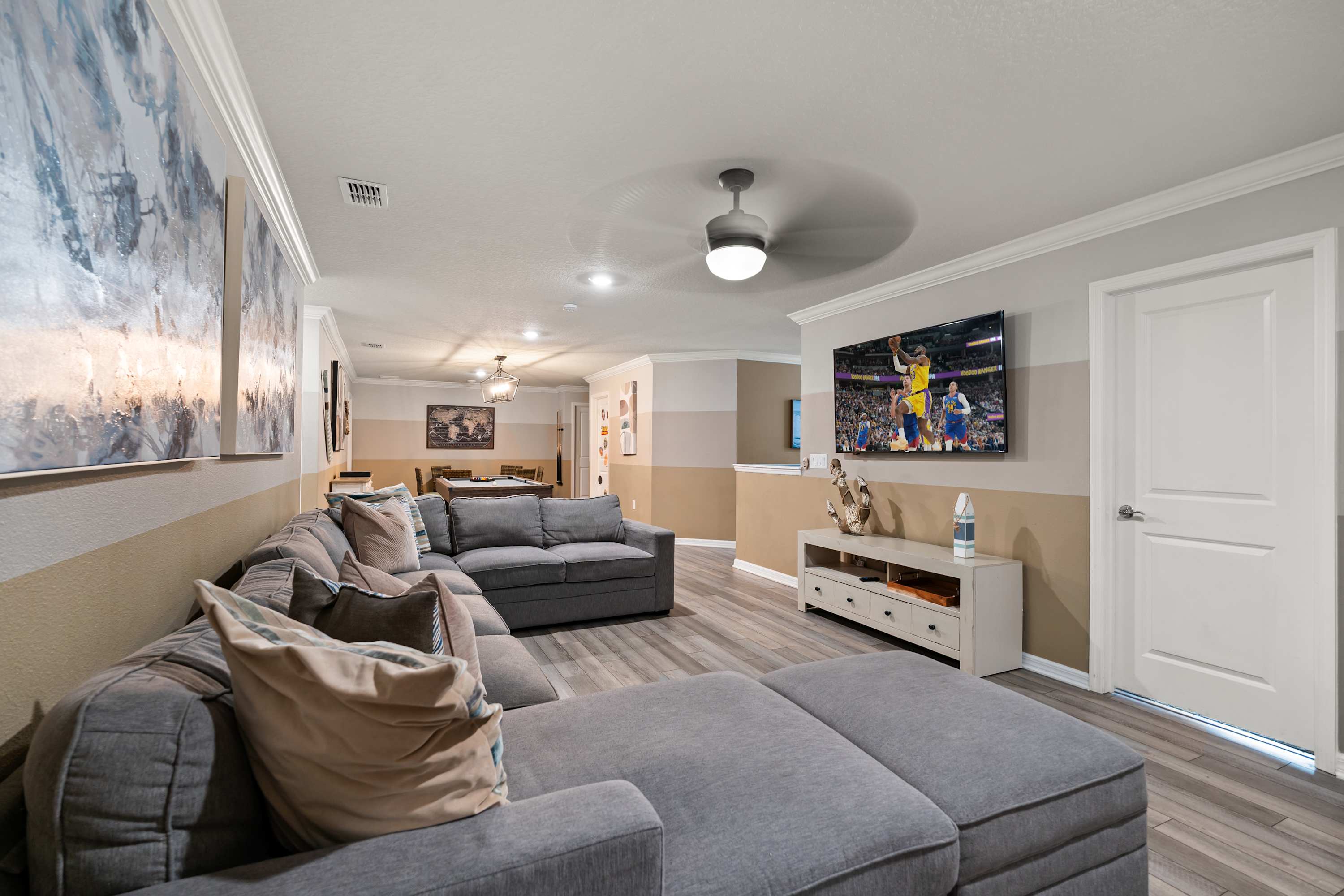 Open living area with comfy seating, perfect for gathering, relaxing, and spending time together