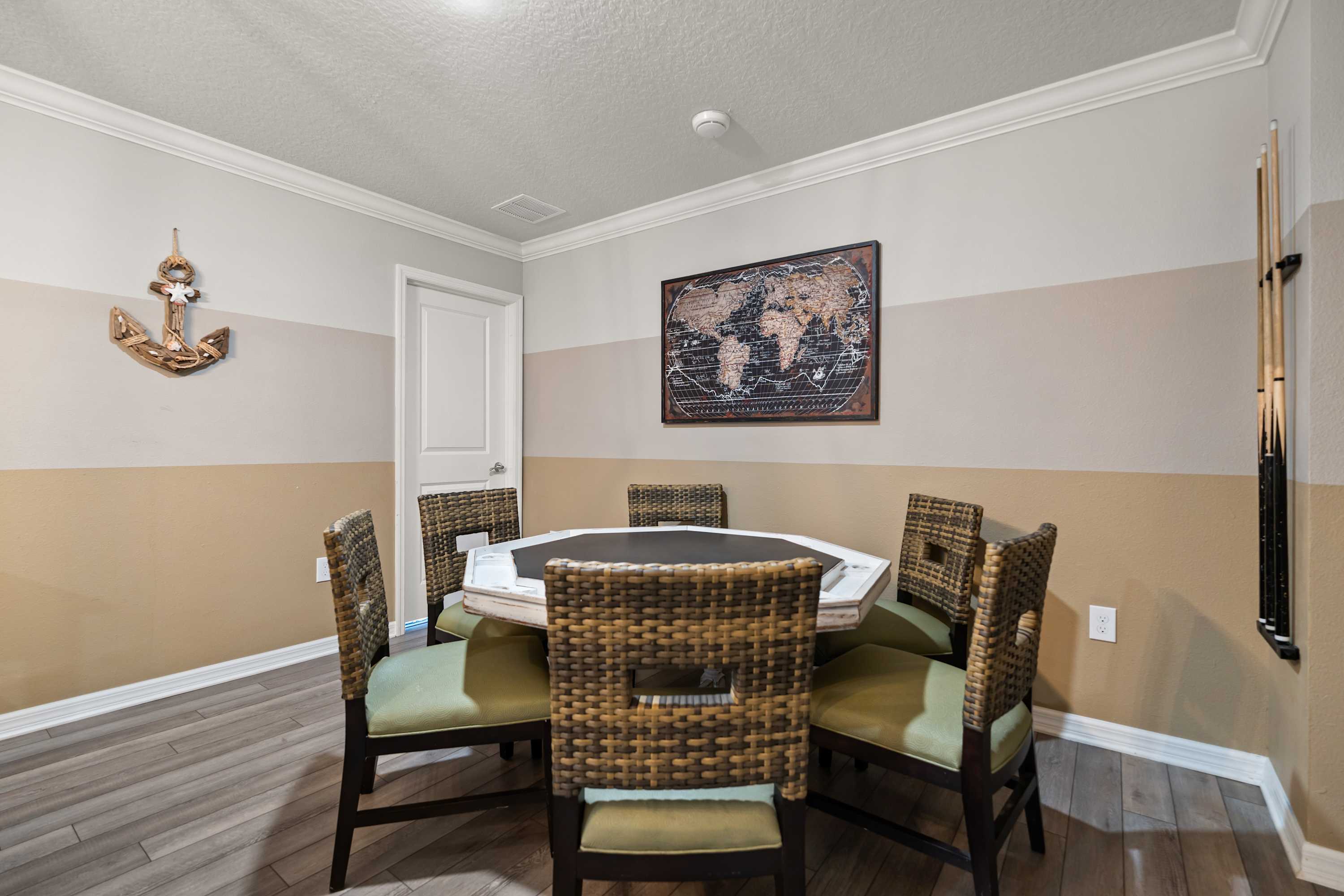 Round table for 6 with surrounding seating, perfect for meals, gatherings, and socializing together