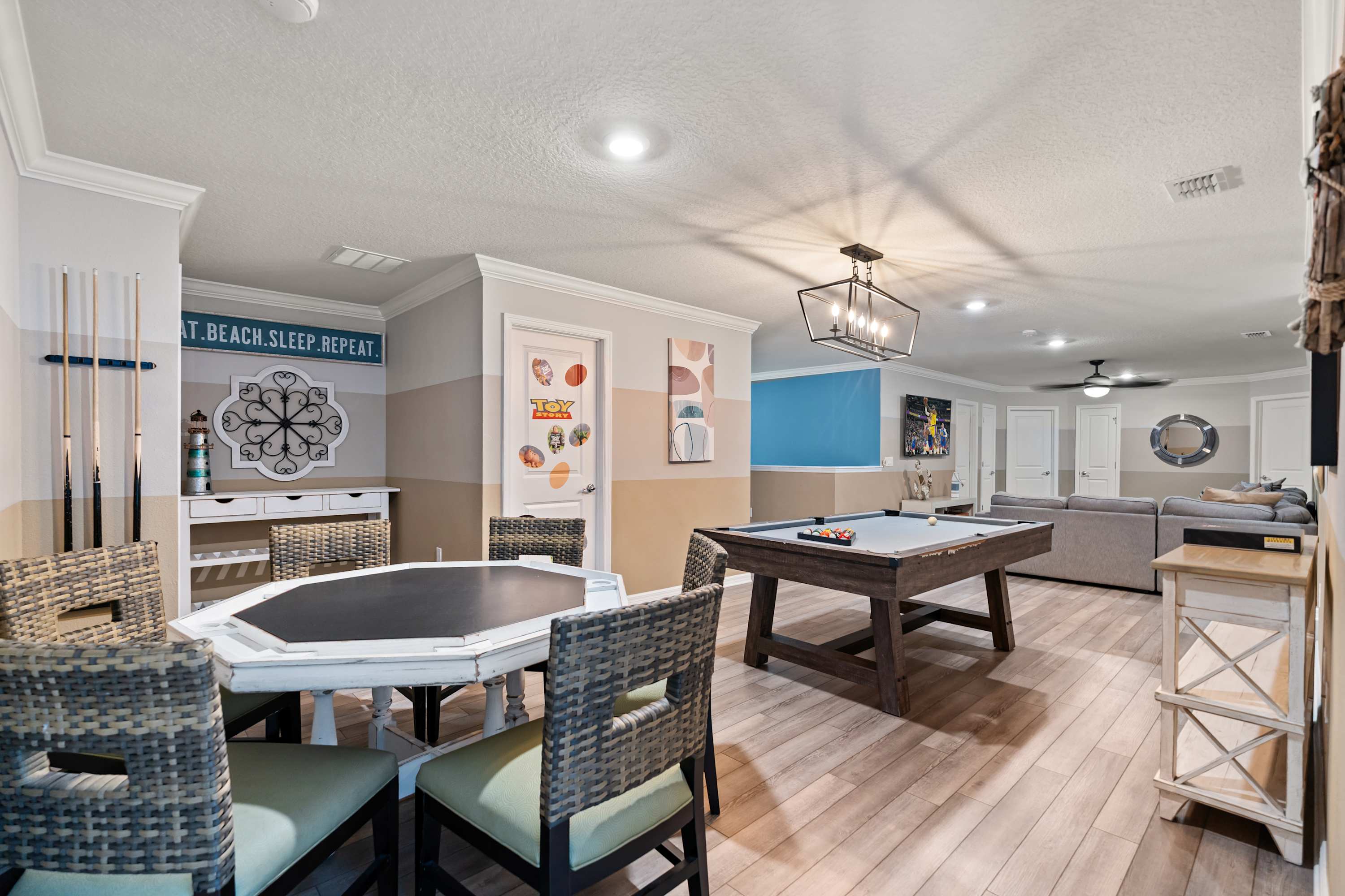 Second-floor living area with billiards and sofa for families, kids, and friends to relax and play