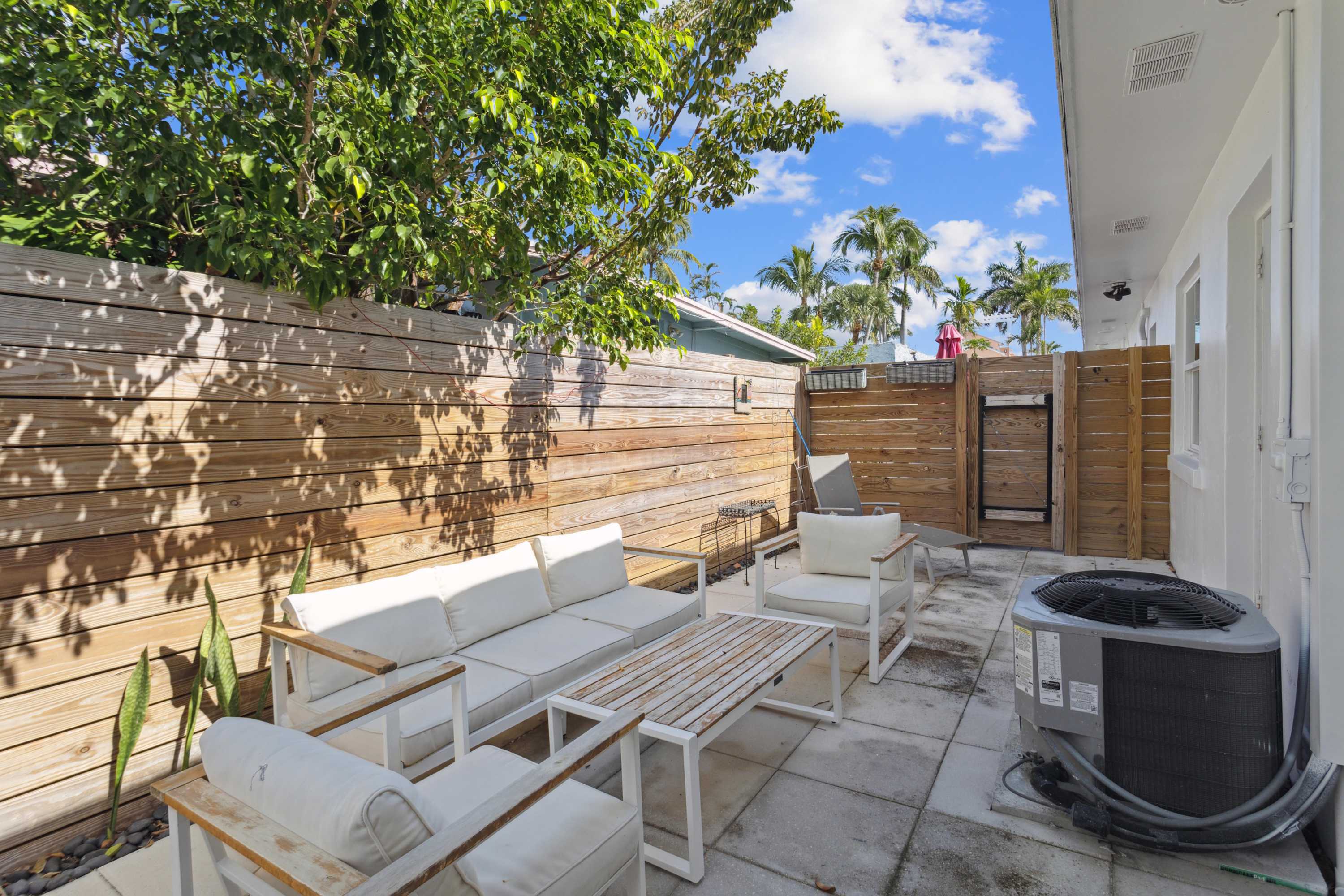 Lounge the day away in the fresh air on the private patio​