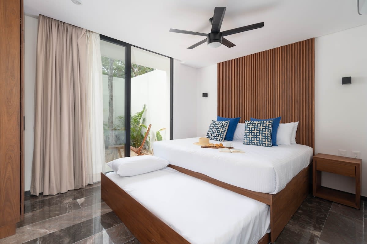 Bedrooms #3, #7, #11, and #15 are representative of the same layout and design across the four villas. While décor details may vary slightly, all rooms are very similar—this image is provided as a reference.