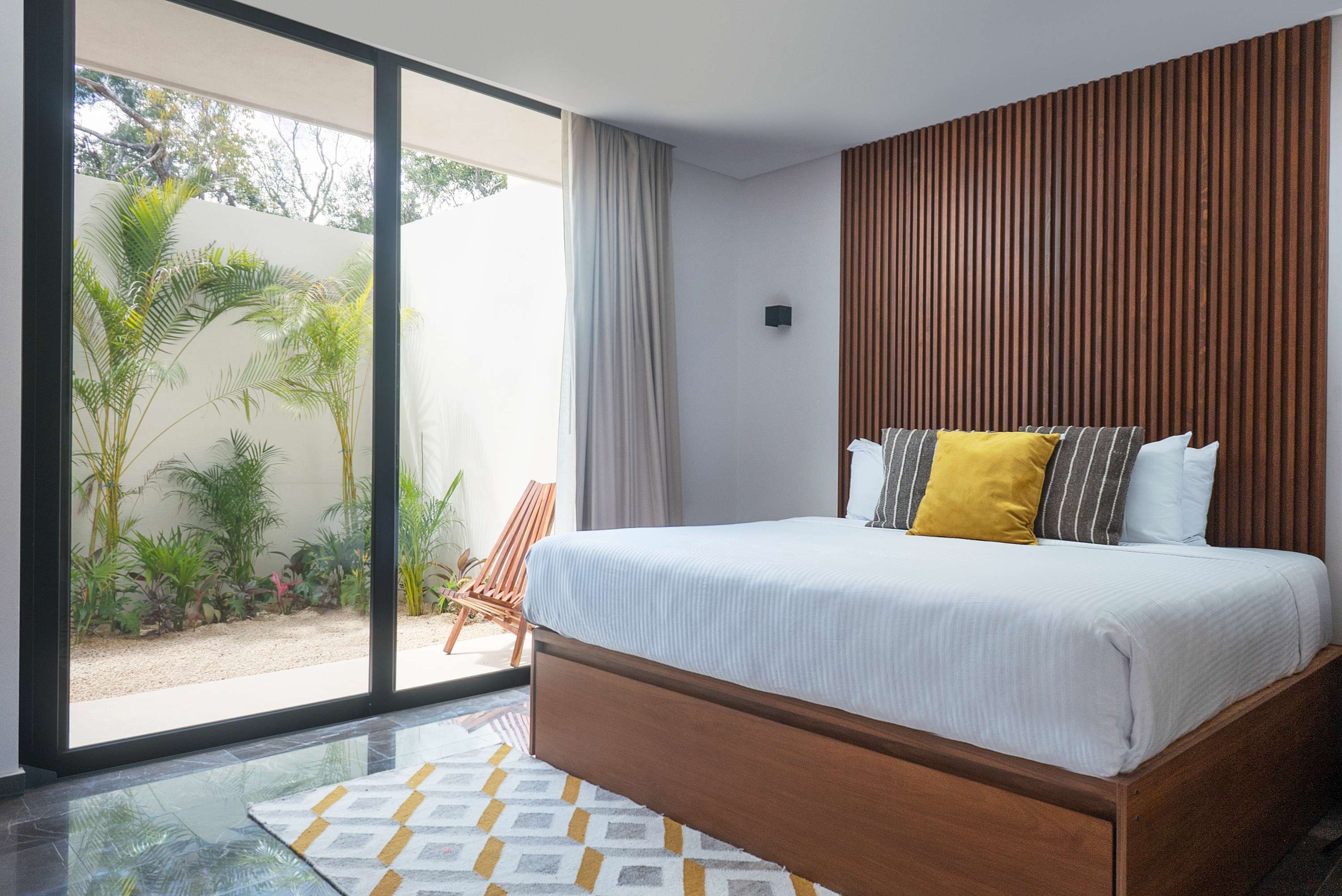 Bedrooms #1, #5, #9, and #13 are representative of the same layout and design across the four villas. While décor details may vary slightly, all rooms are very similar—this image is provided as a reference.