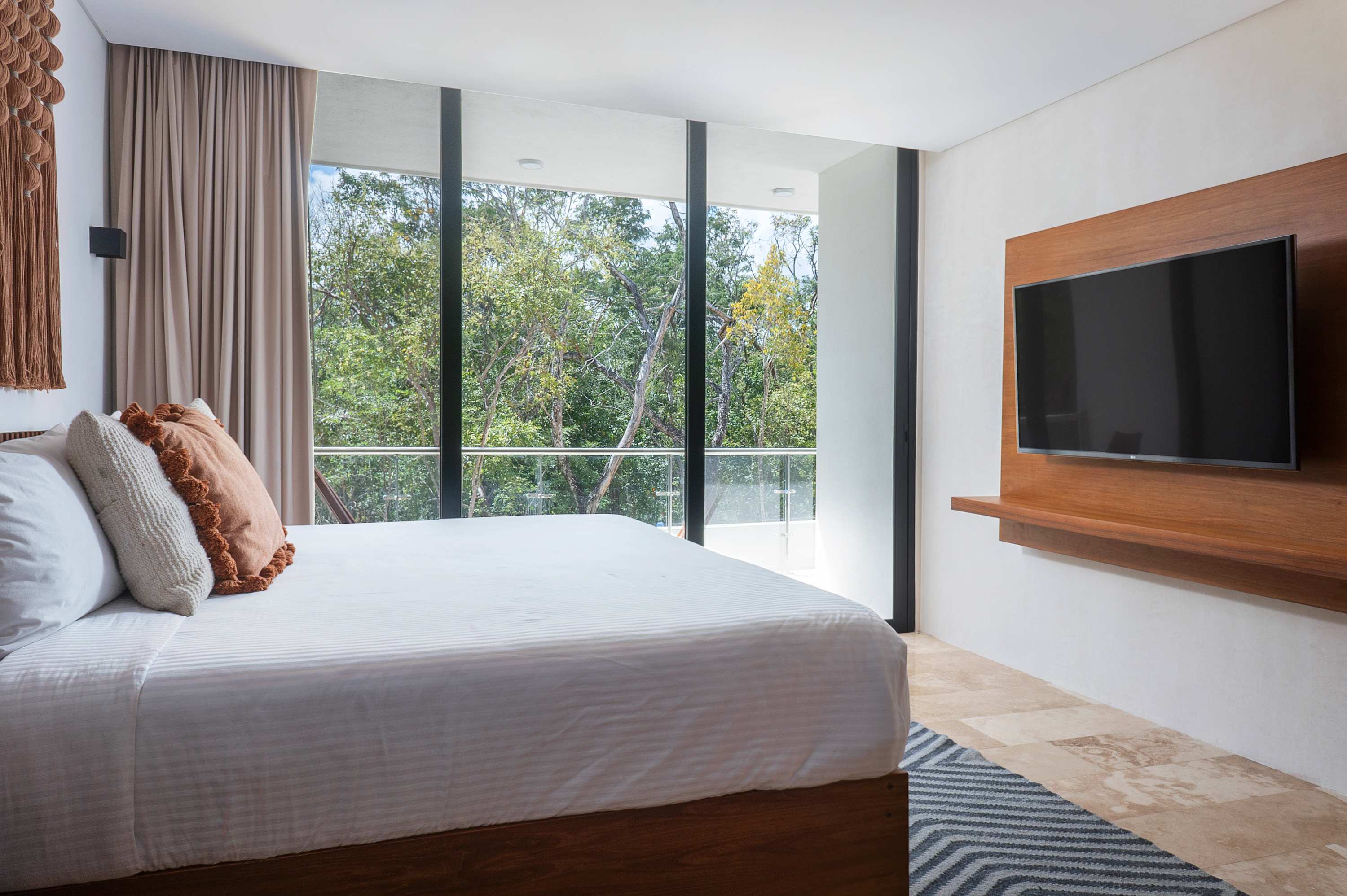 Bedrooms #2, #6, #10, and #14 are representative of the same layout and design across the four villas. While décor details may vary slightly, all rooms are very similar—this image is provided as a reference.