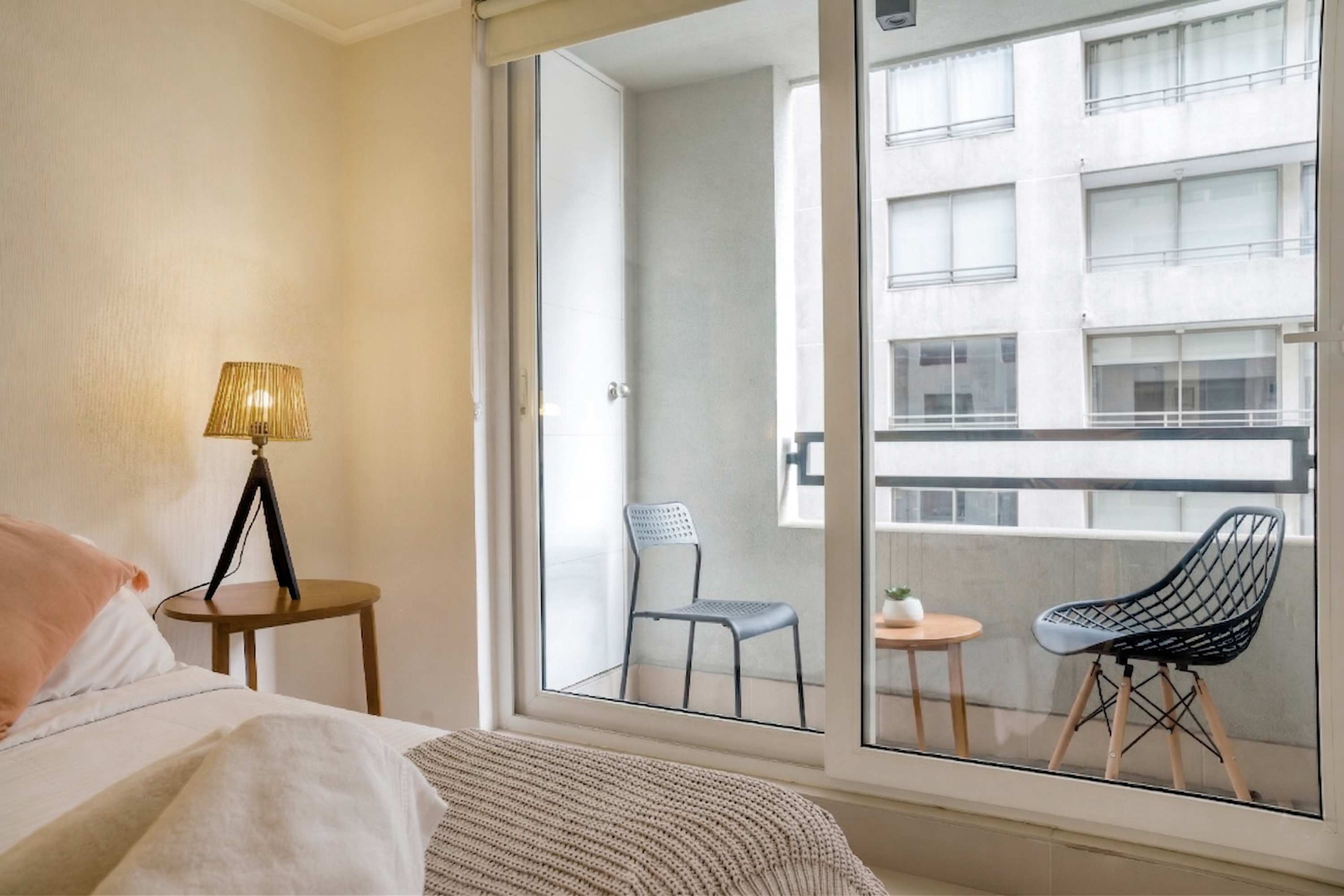 Relax in this cozy studio with a charming balcony view, perfect for enjoying a morning coffee or evening breeze.