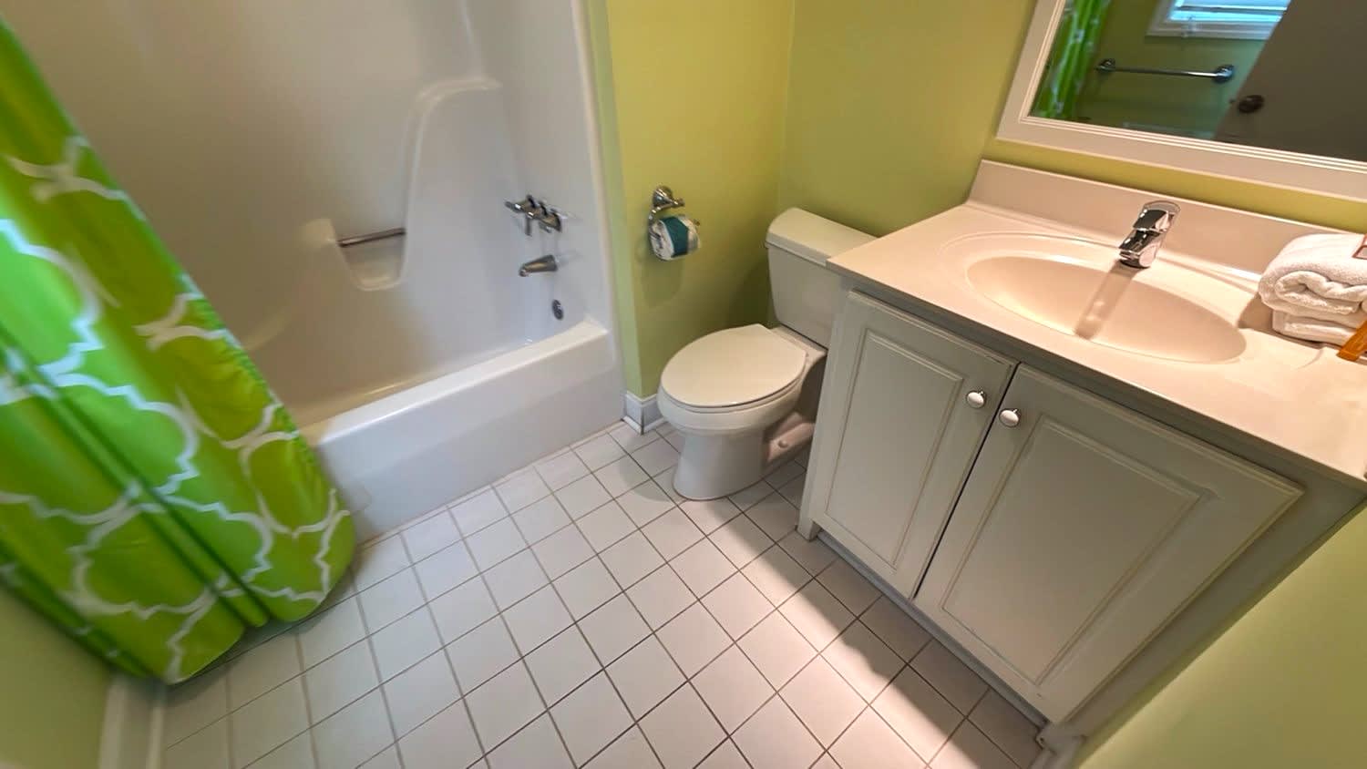 Guest En Suite Bathroom with Tub Shower Combo